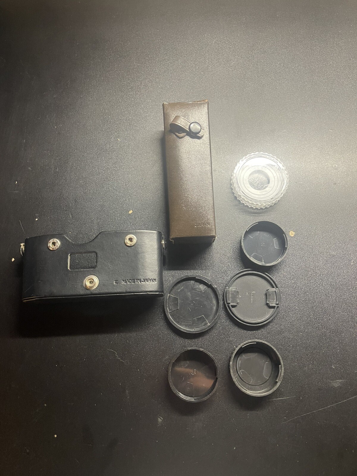 Camera Parts. Mainly Camera Lens Cases (A7)