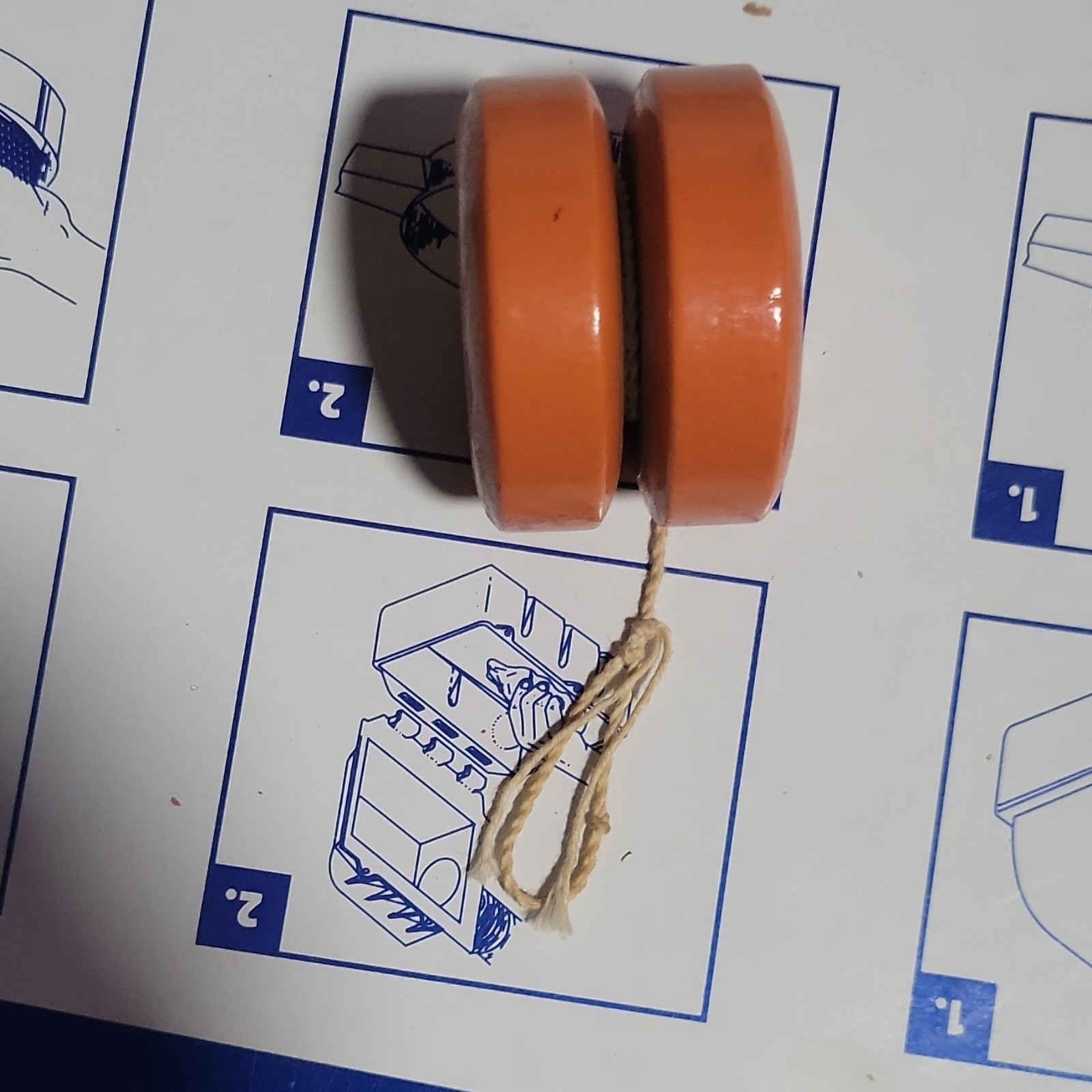 Orange Yo-Yo with Gray Center and String Modern Design