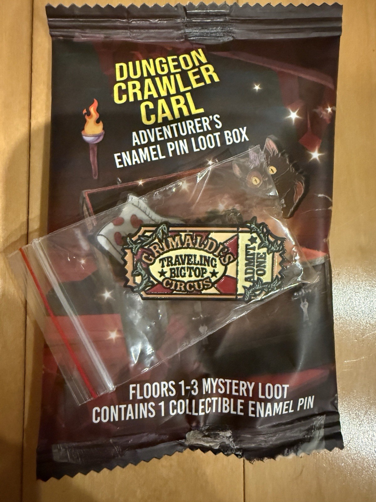 New Foam Brain Games Dungeon Crawler Carl Grimaldi's Ticket Loot Box Enamel Pin