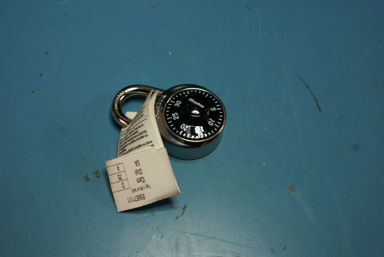 Master Lock 1525 Preset Combination Padlock, Black Dial V705 Key