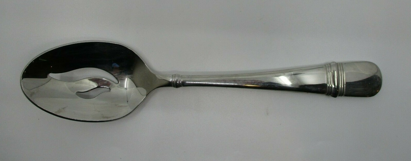 ONEIDA STAINLESS ASTRAGAL PIERCED SERVING SPOON - 8 1/2" - 02I