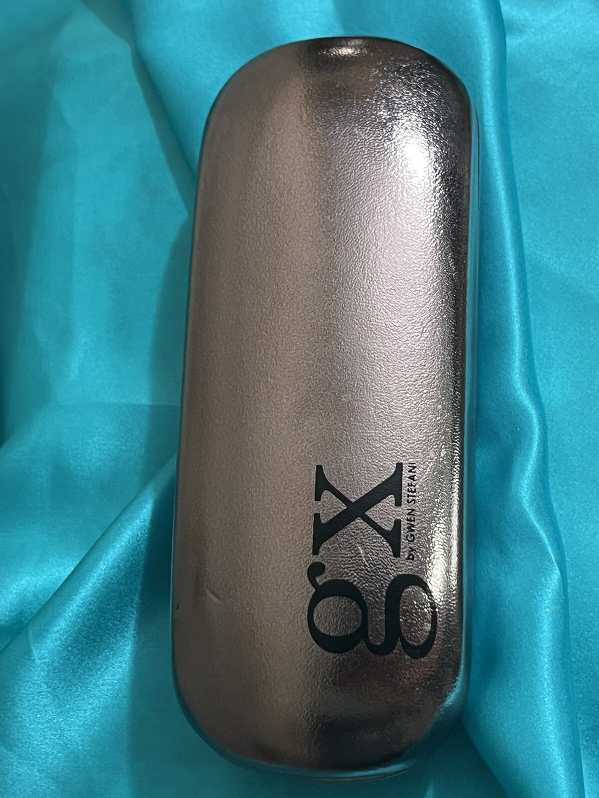 Authentic GX  by Gwen Stefani Metalic Hard Eye Glasses Case Used Condition