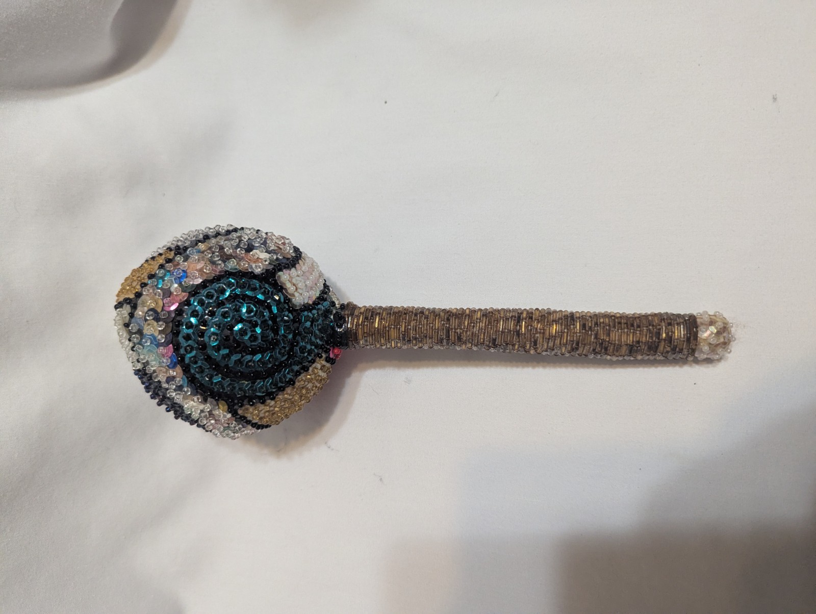 Colorful sequined voodoo maraca rattle - please read