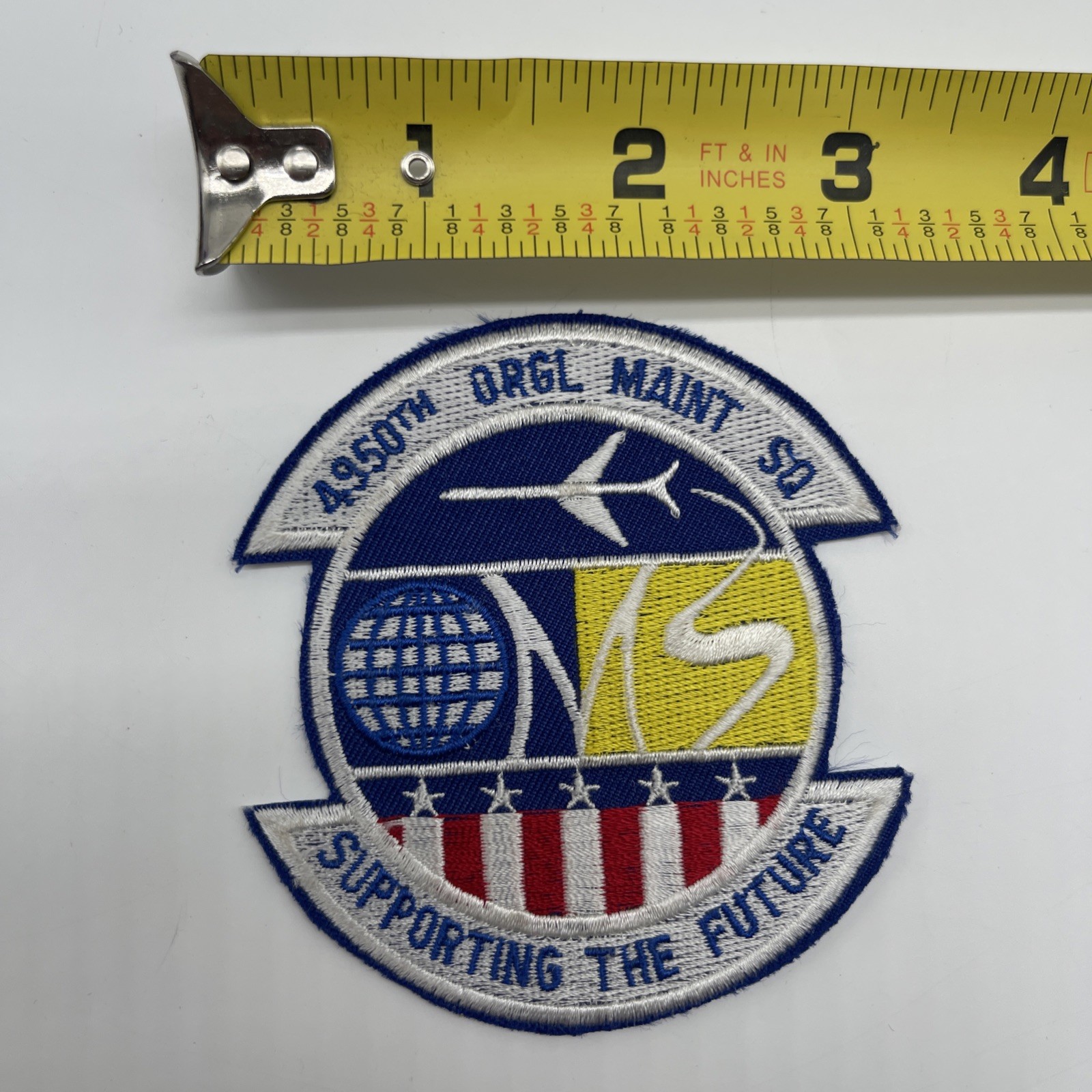 U.S. Military 4950th Organizational Maintenance Squadron Patch Insignia Cut