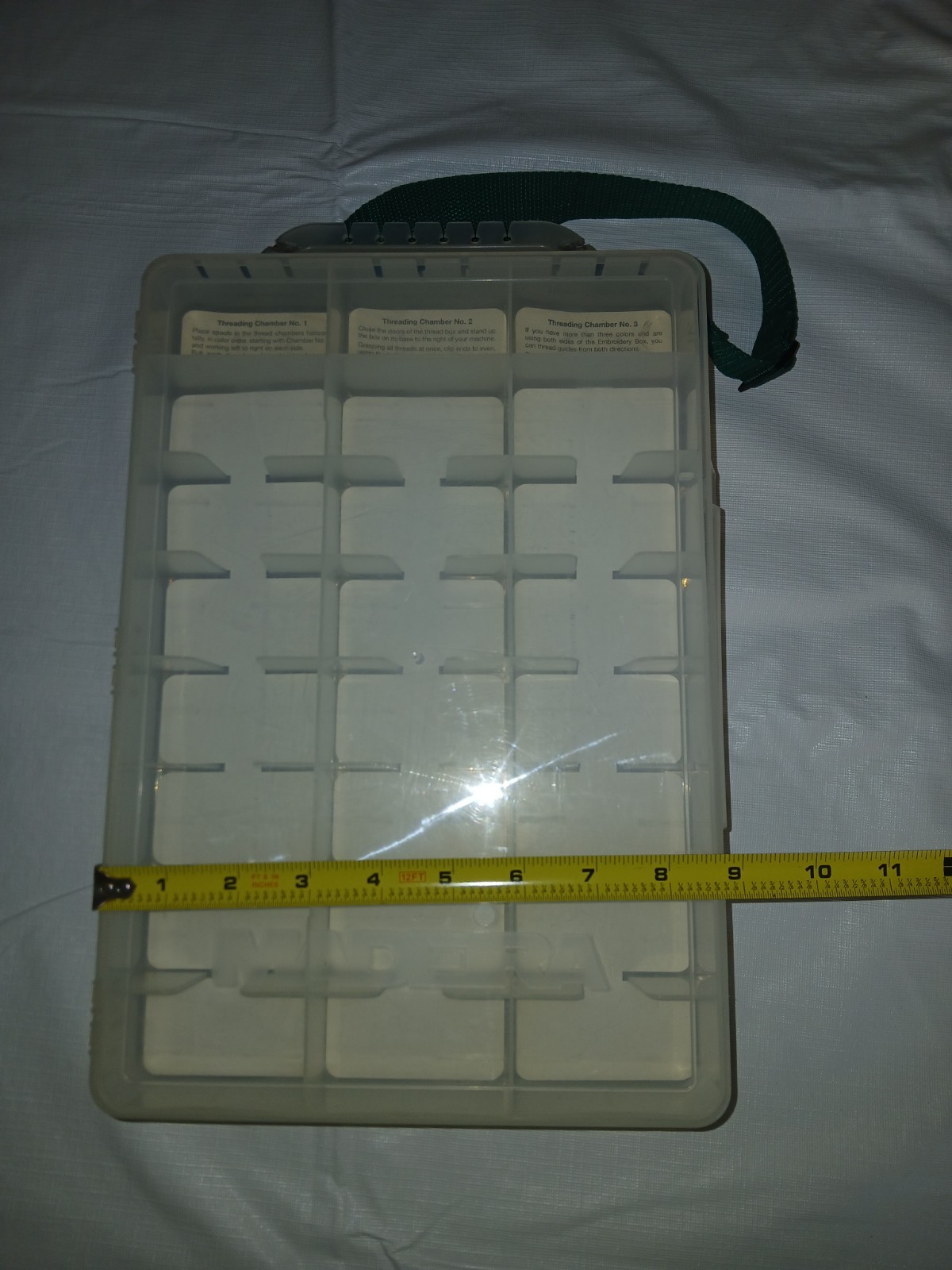 Machine embroidery thread case with cutters and thread holes