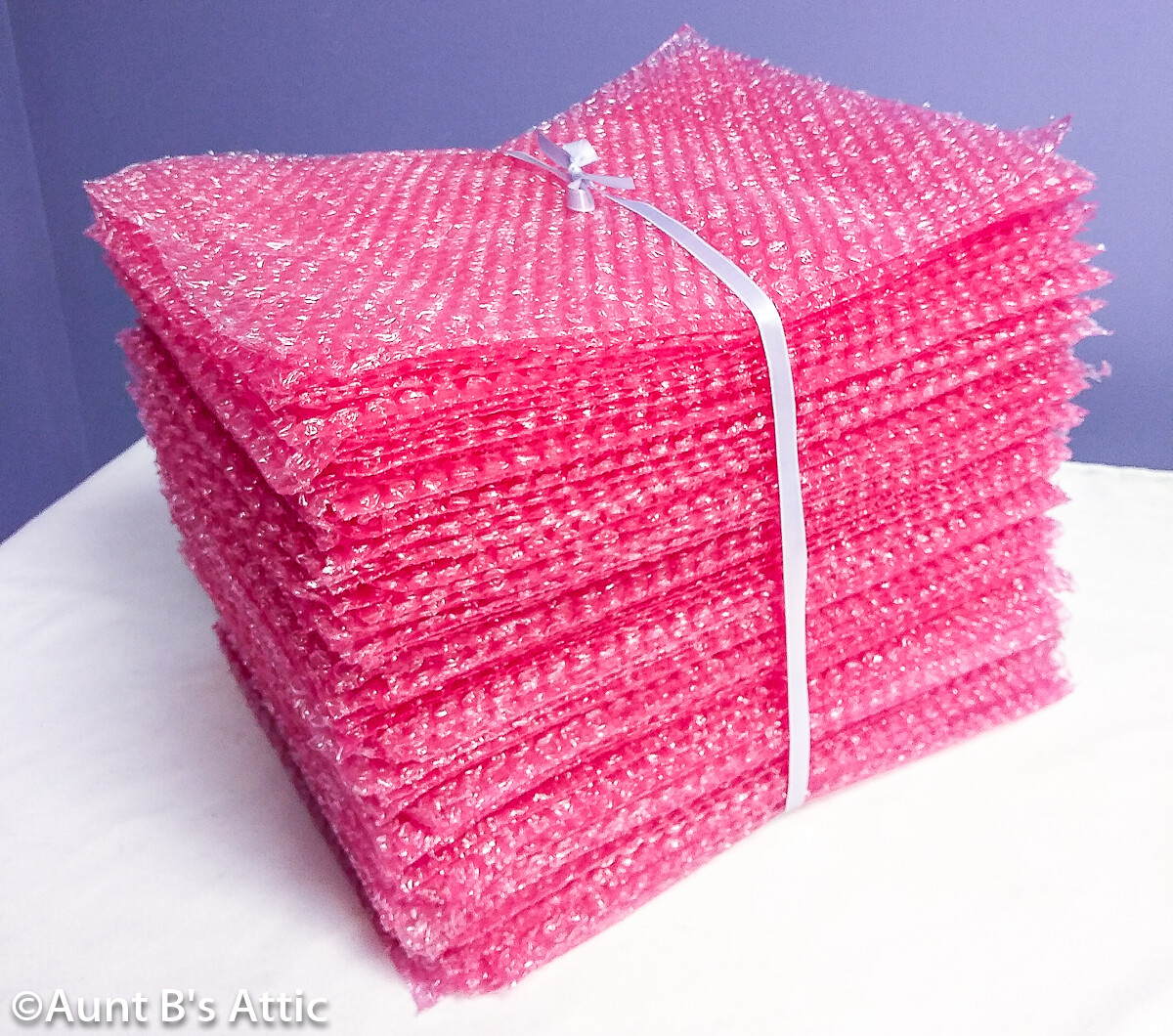 Packing Material 15" x 12" Pink Individual Pre-Cut Small Air Pocket Bubble Sheet