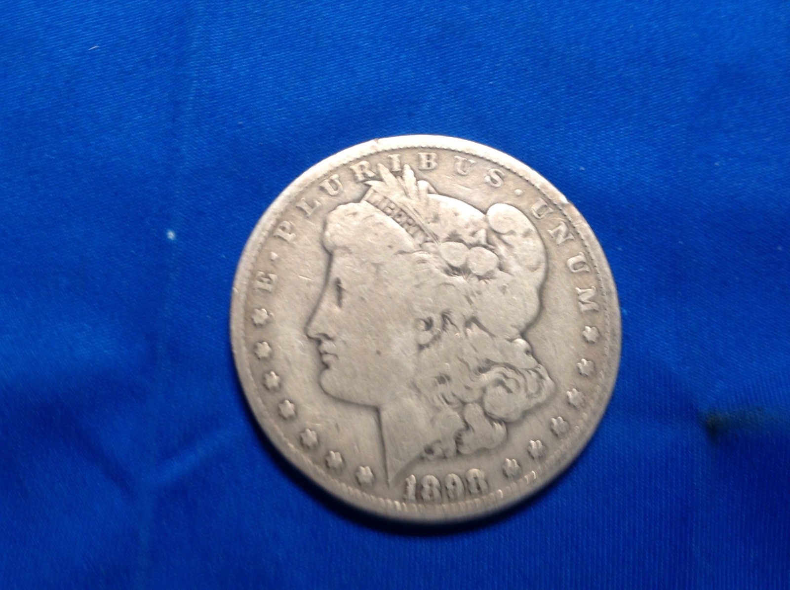 1898 Morgan Head Silver Dollars (lt green)
