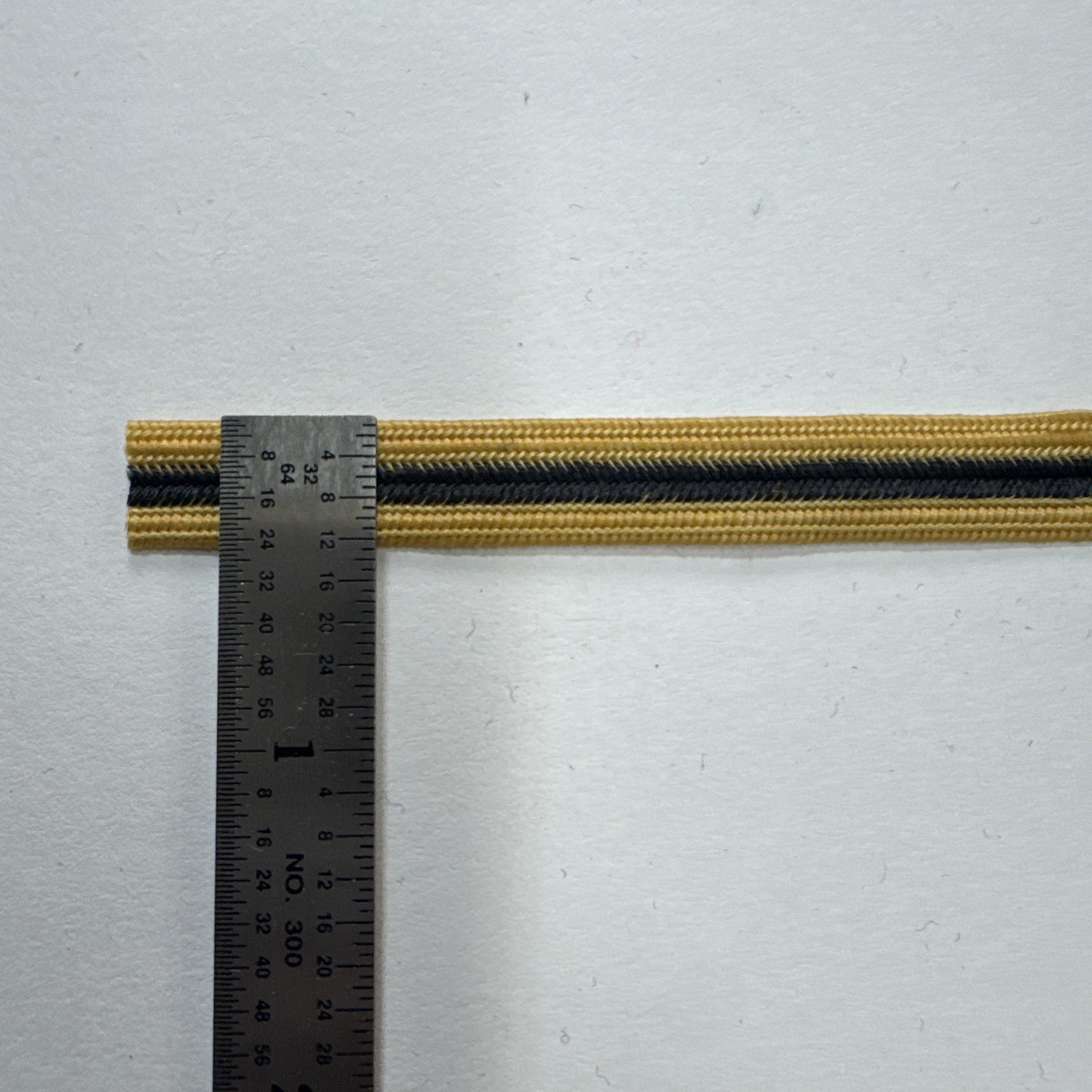 Rice Braid-3/8” Tan With Dark Navy Center Stripe Braid. 50 Yards. Made In USA
