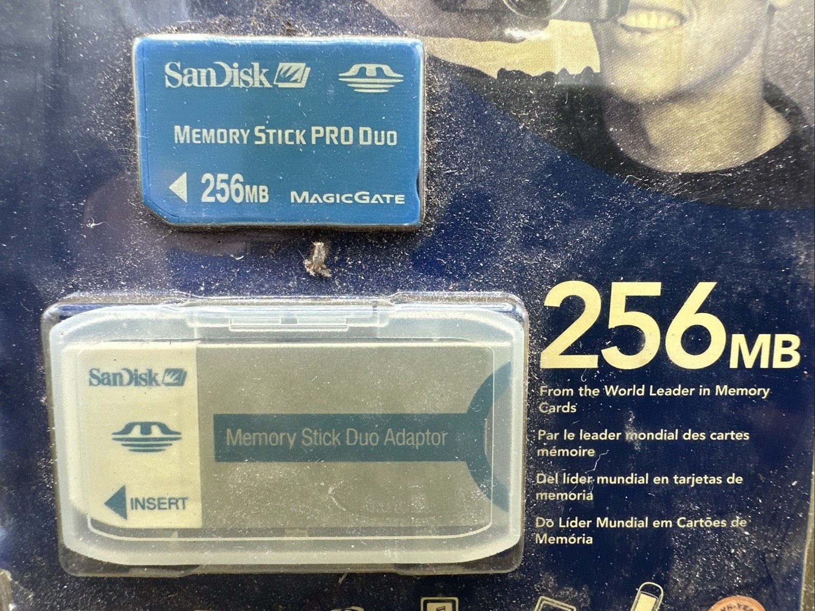 New Unopened SanDisk 256 mb Memory Stick Pro Duo w/adapter- Ugly Casing- READ