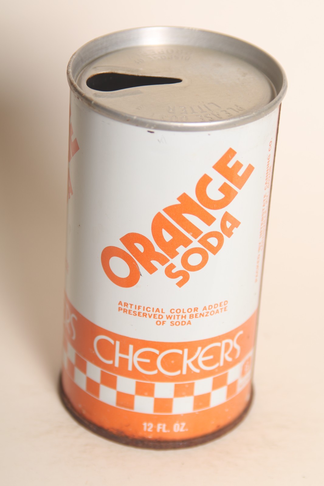 Checkers Orange soda can
