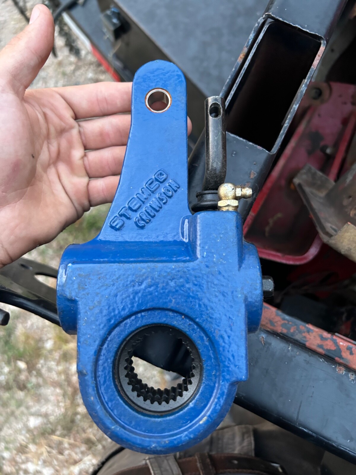 Slack Adjuster. Stemco Crewson-brand, blue, for a semi or semi trailer