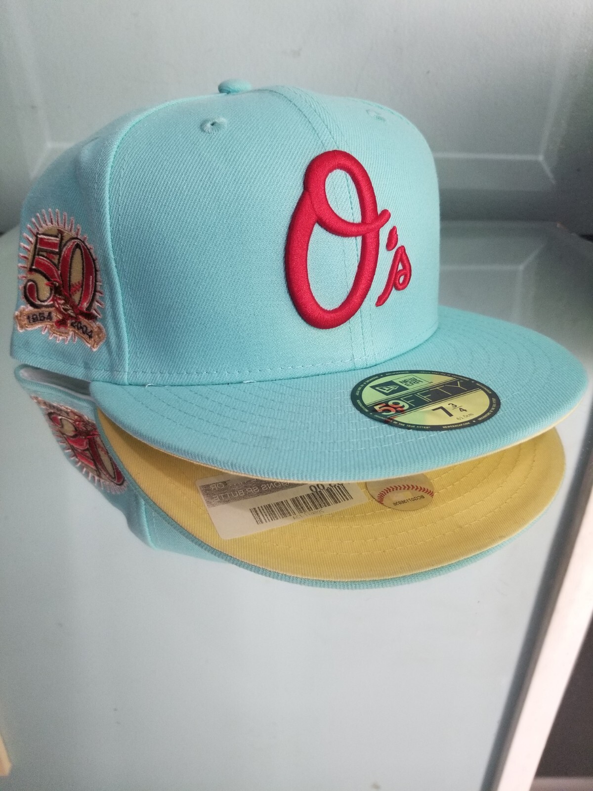 Topperz 7 1/2 New Era Baltimore Orioles Fitted Cap.