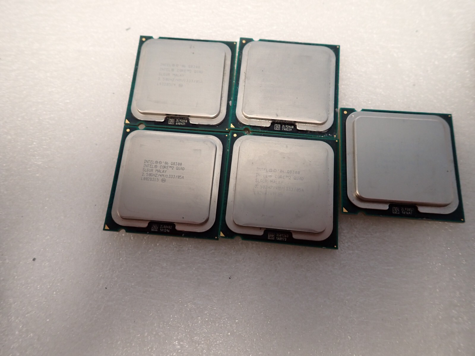 Lot of (5) Intel SLGUR Quad Q8300 2.5GHz LGA 775 Desktop CPU