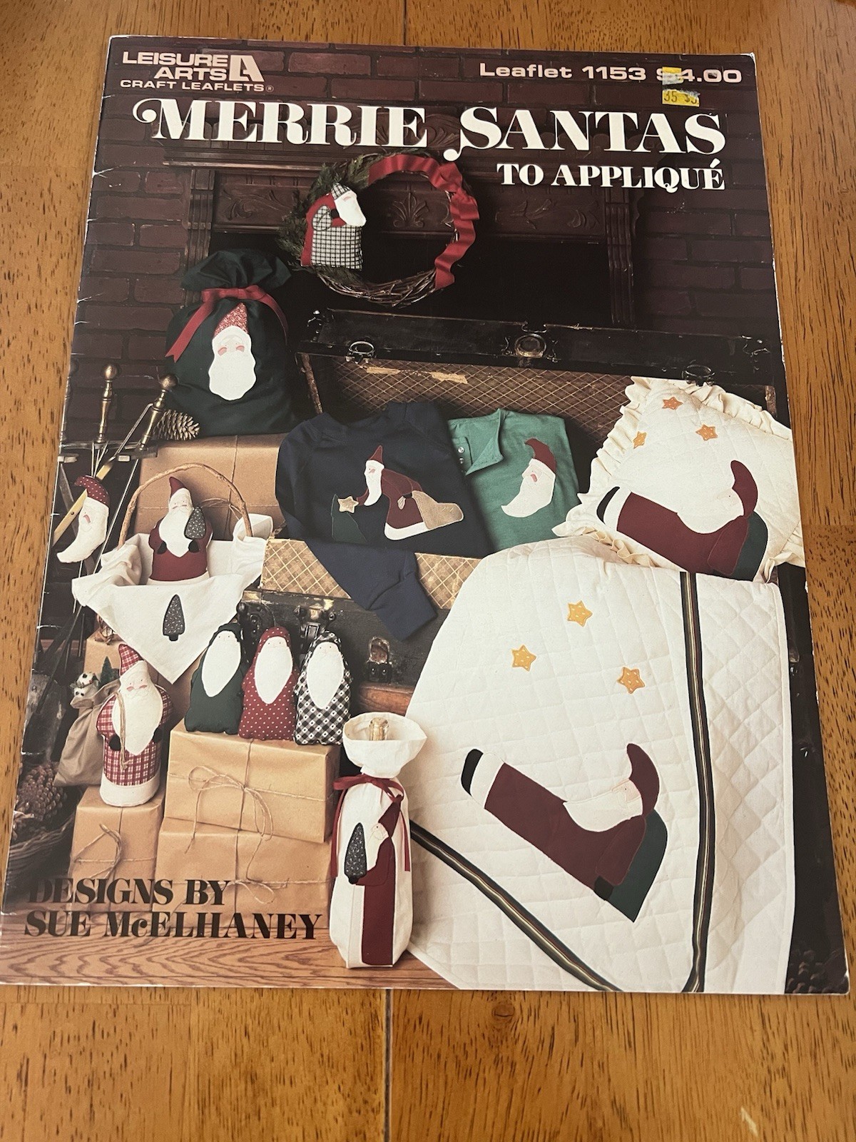 Leisure Arts -MERRIE SANTAS To Applique-leaflet#1153- Designs by Sue McElhaney