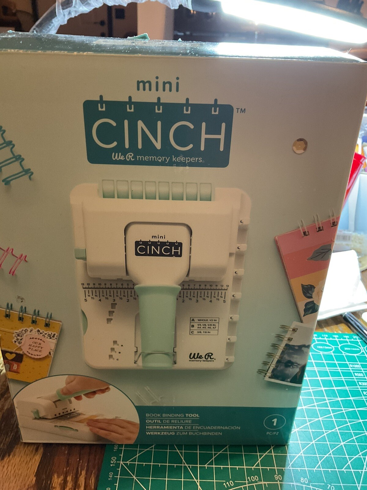 We R Memory Keepers Mini Cinch Book Binding Tool , turquoise color, used maybe 2