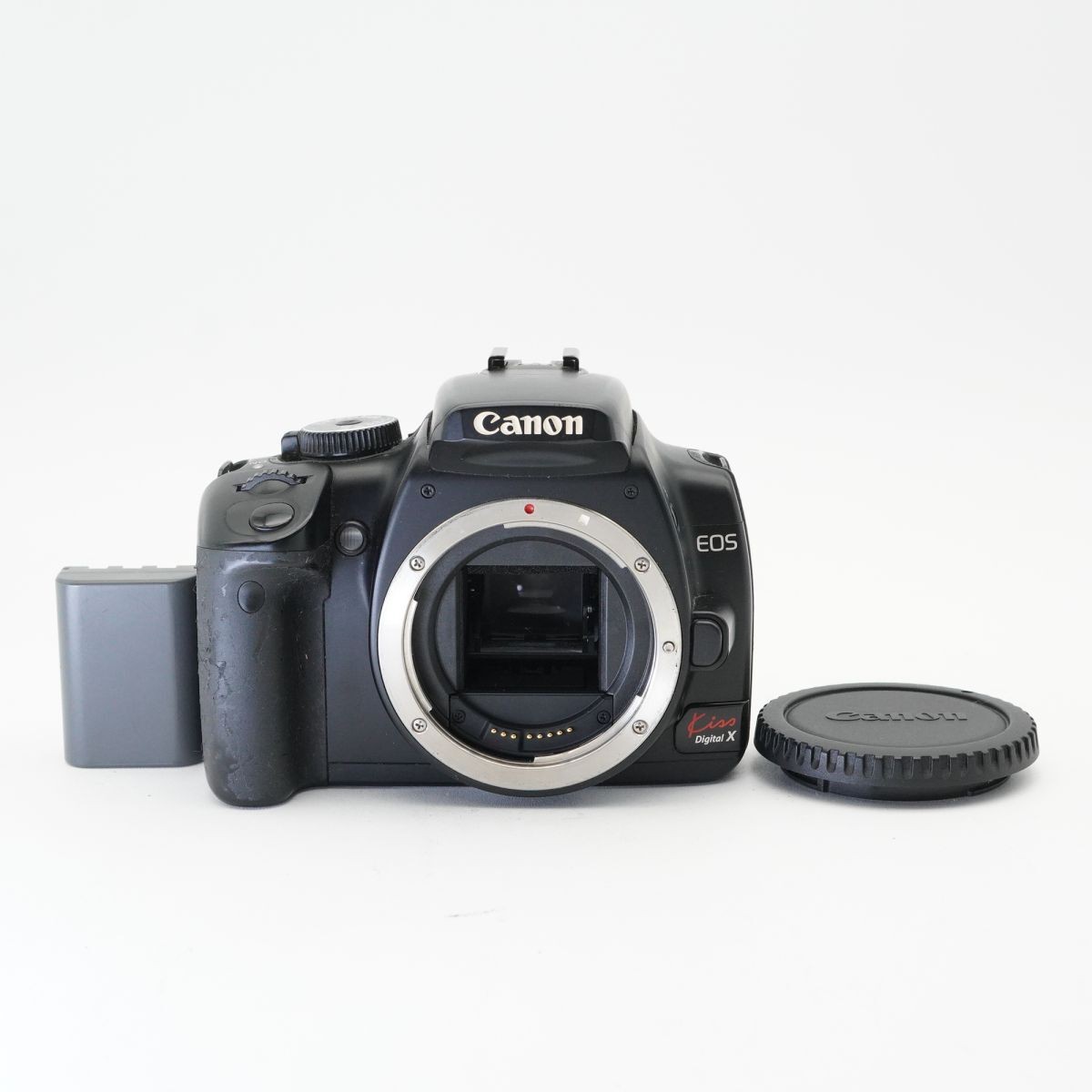 , working Canon EOS KISS DIGITAL X digital SLR camera #d0B3460