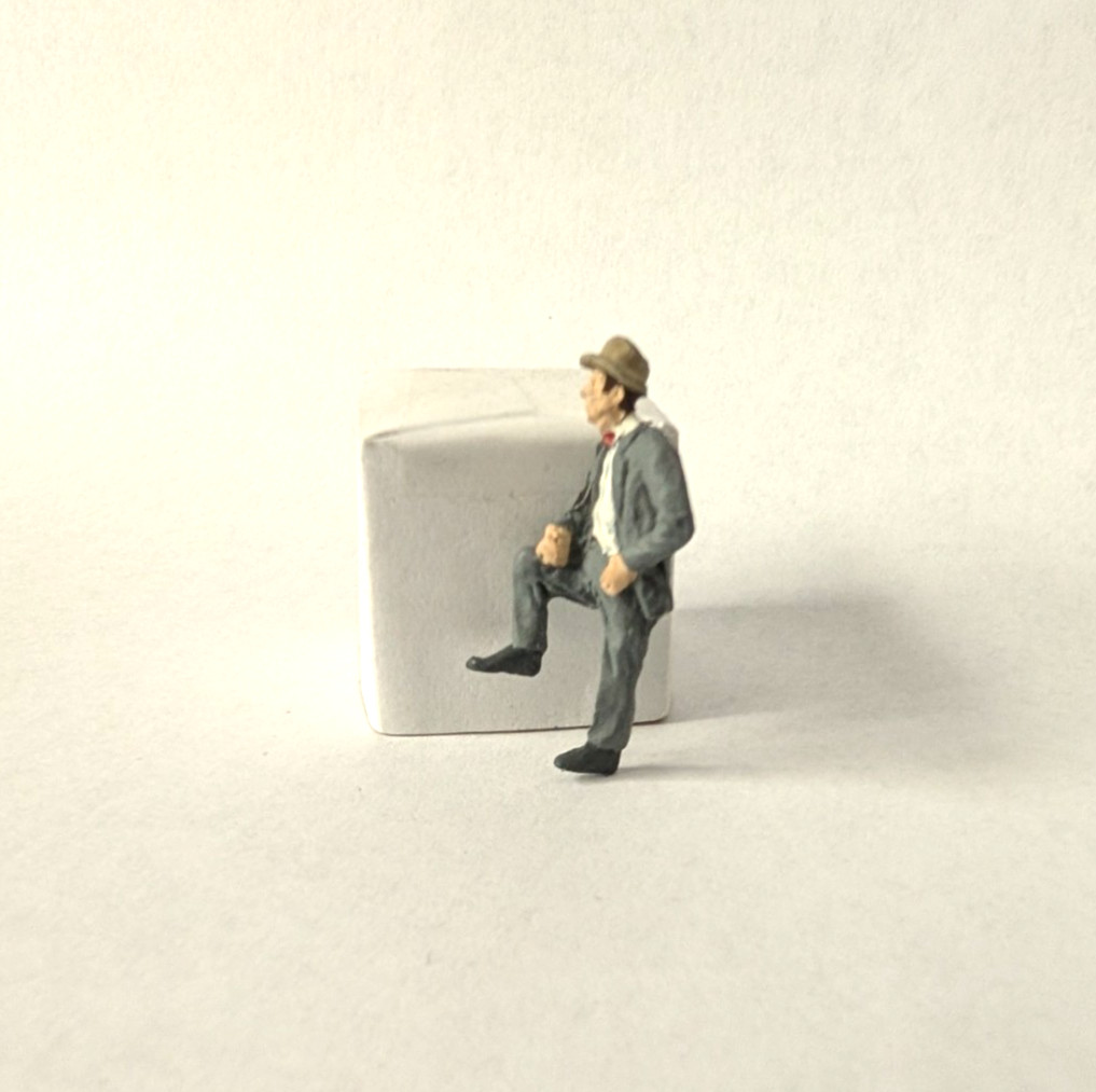 Arttista #1126 - Man in Suit with Foot up - O Scale Figure - Model Trains NEW