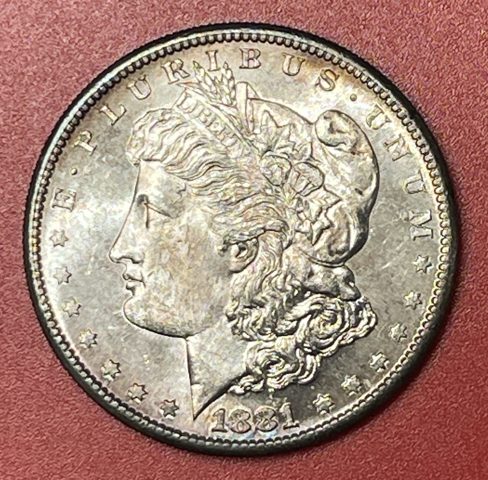 1881 S Morgan Silver Dollar, Gem Uncirculated. Beautiful Golden Toning.