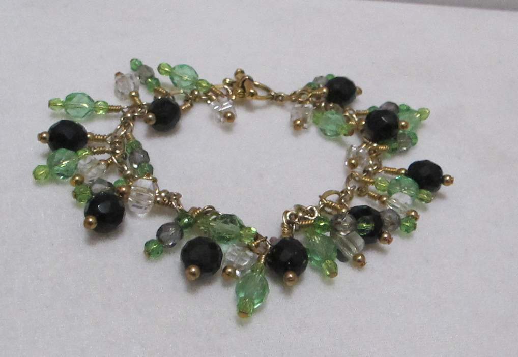 Artisan 9” Gold Tone Charm Bracelet Lt Green, Black, Clear Dangling Crystals