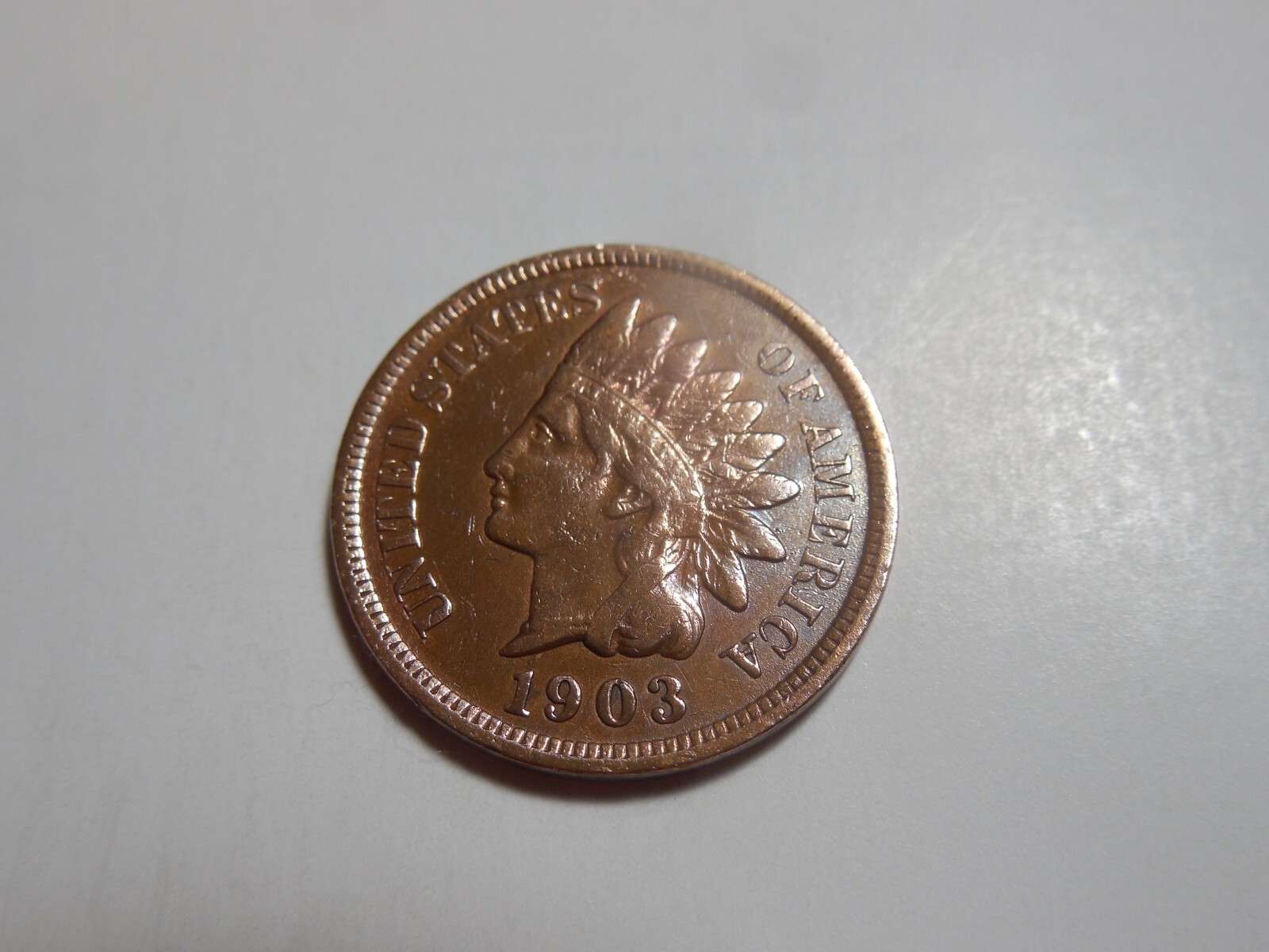 1903 Indian Head Penny in solid VF condition . But you decide!!!!!