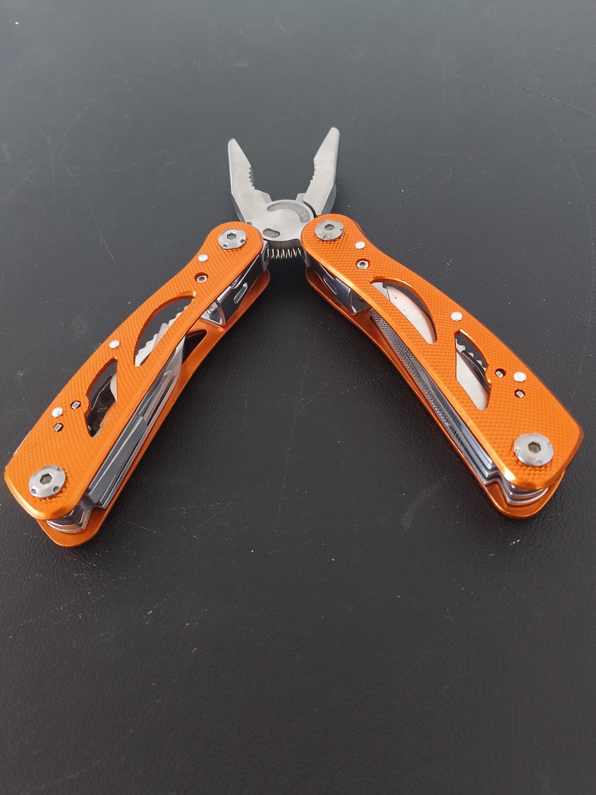 Quality Durable Stainless Steel -Orange Multi Tool.