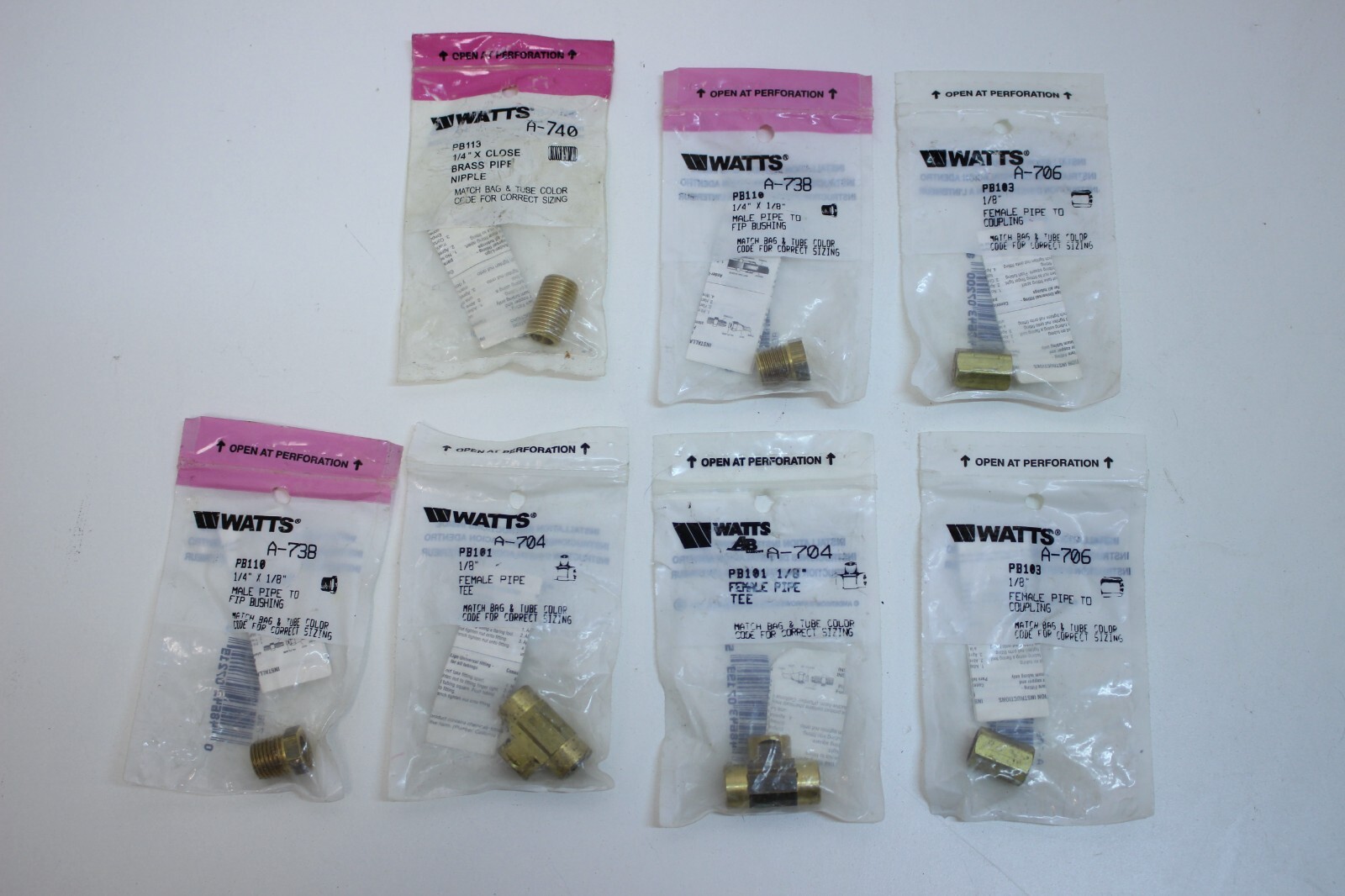 Lot of 7 New in package Watts 1/8" & 1/4" Brass Fittings