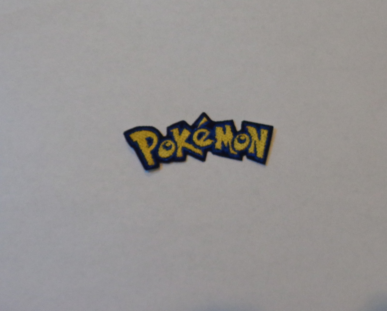 "Pokemon Logo"-  Iron-On Embroidered Patch