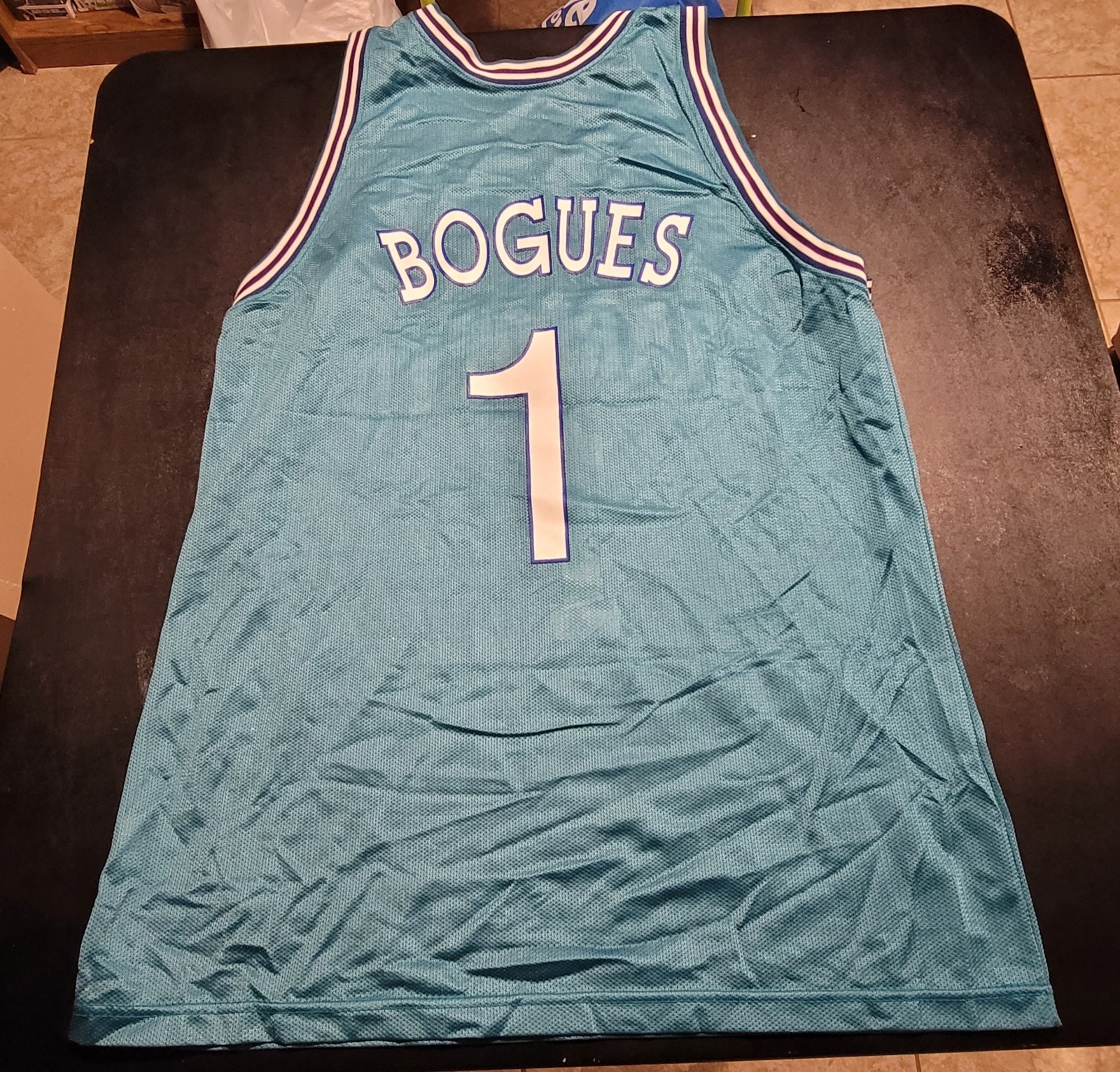 Vintage Mugsy Bouges Charlotte Hornets Basketball Jersey. Size 48