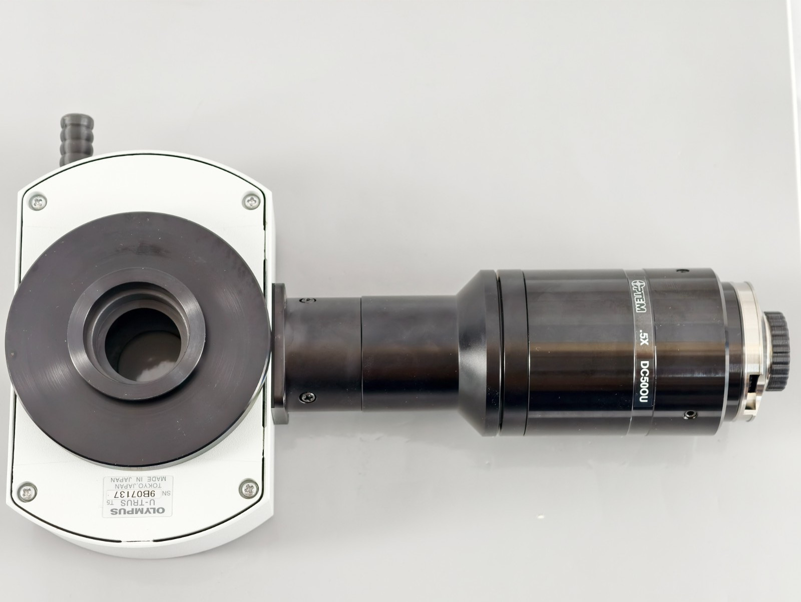 Olympus Microscope U-TRUS with Riser and Optem 0.5x C Mount Camera Adapter
