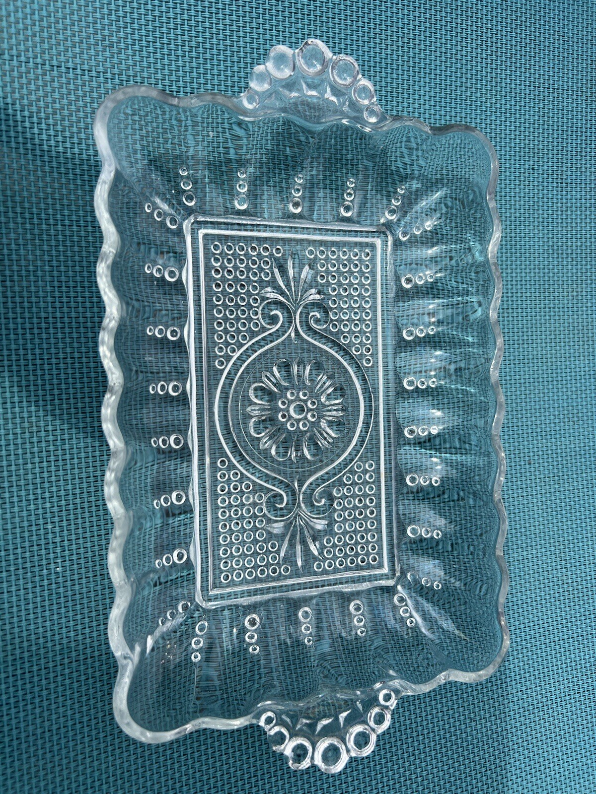 small rectangle shape crystal server with handles.  In good condition.