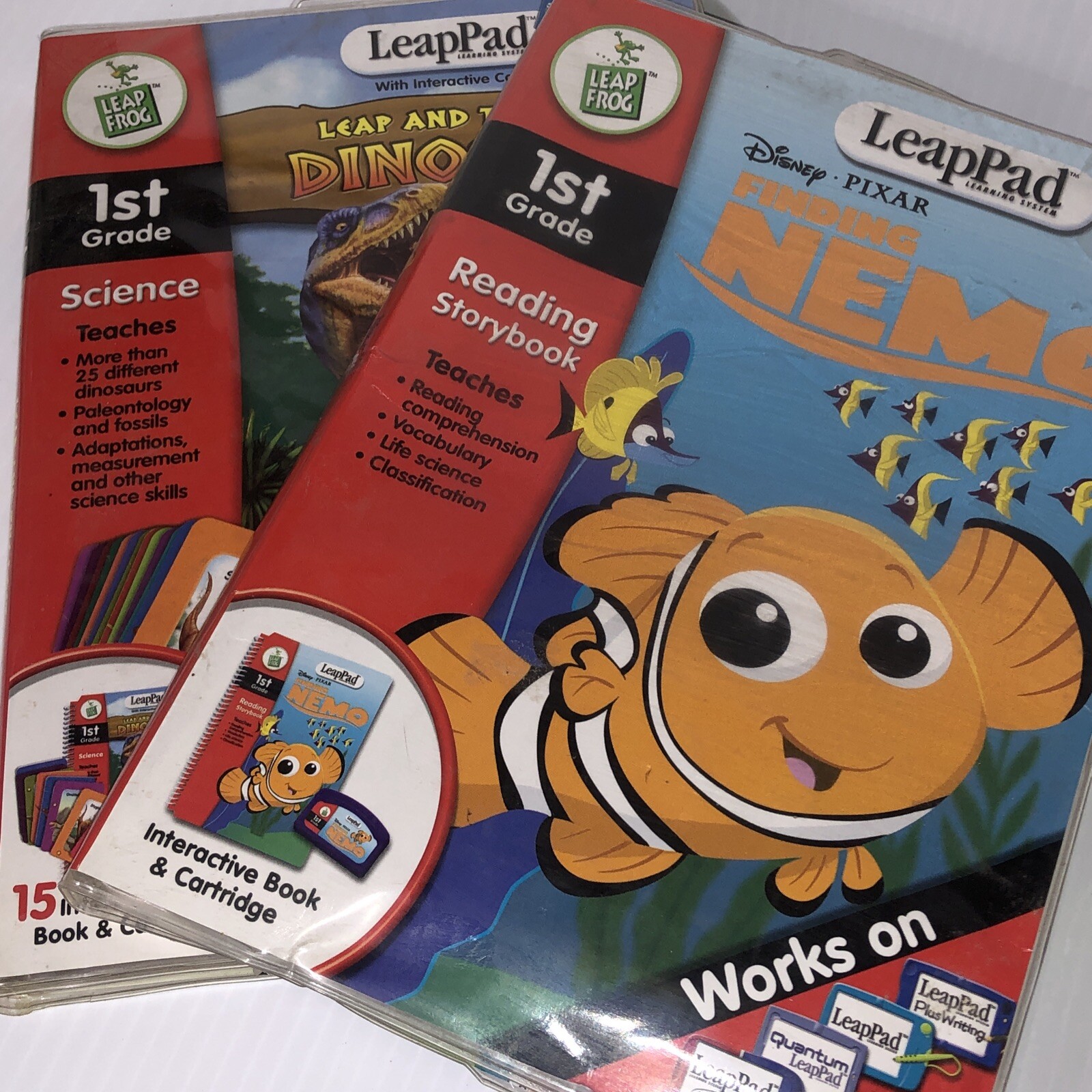Lot Of 2 LeapFrog LeapPad Leap and the Lost Dinosaur Finding Nemo 1st Grade/115j