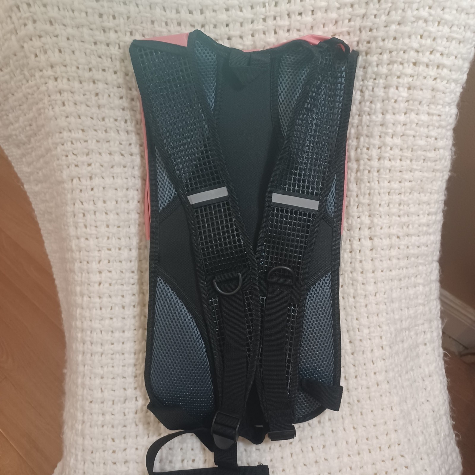 Pink Juboury hydration backpack.