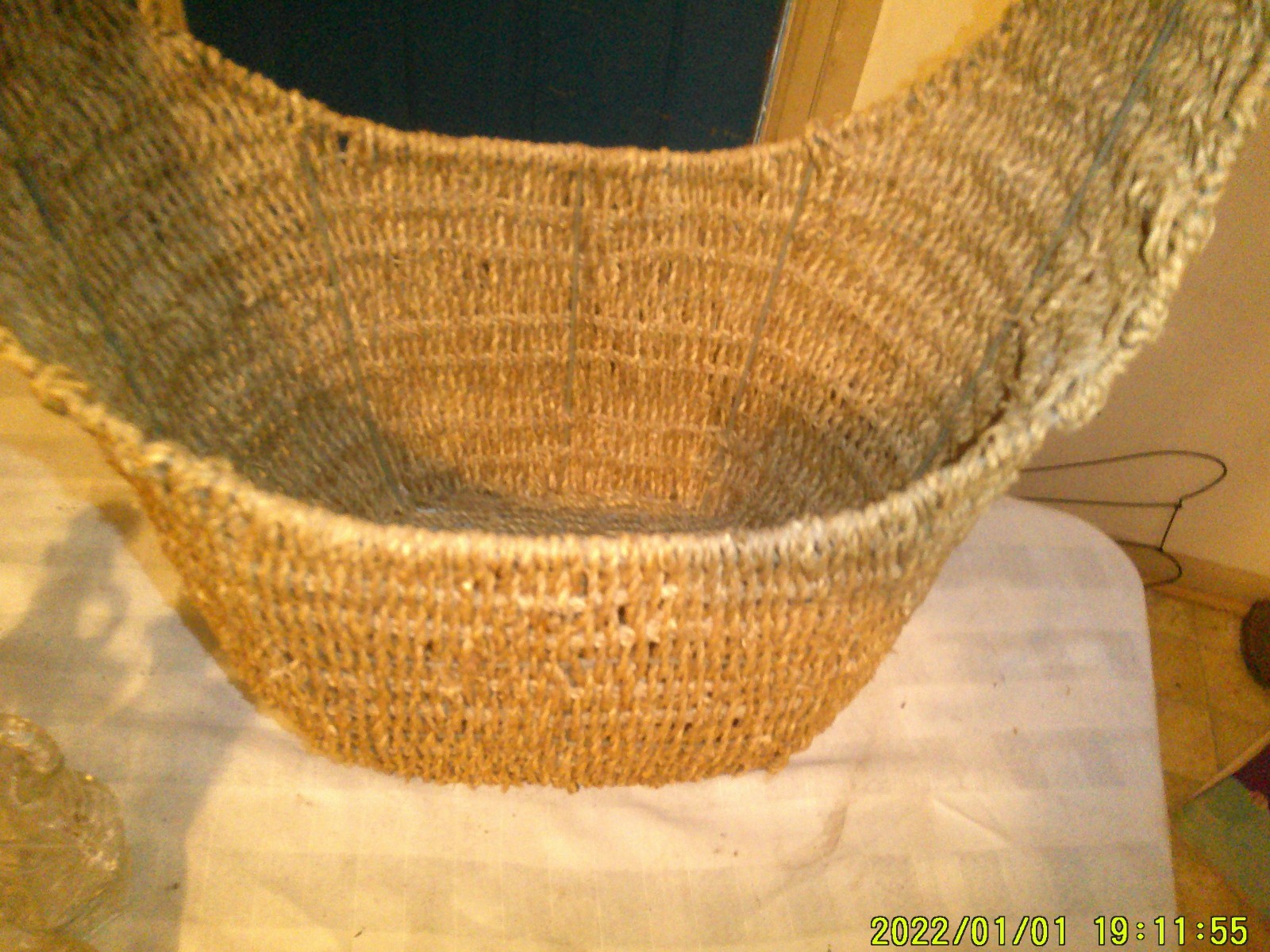 OLDER WIRE FRAMED WEAVED MAGAZINE BASKET
