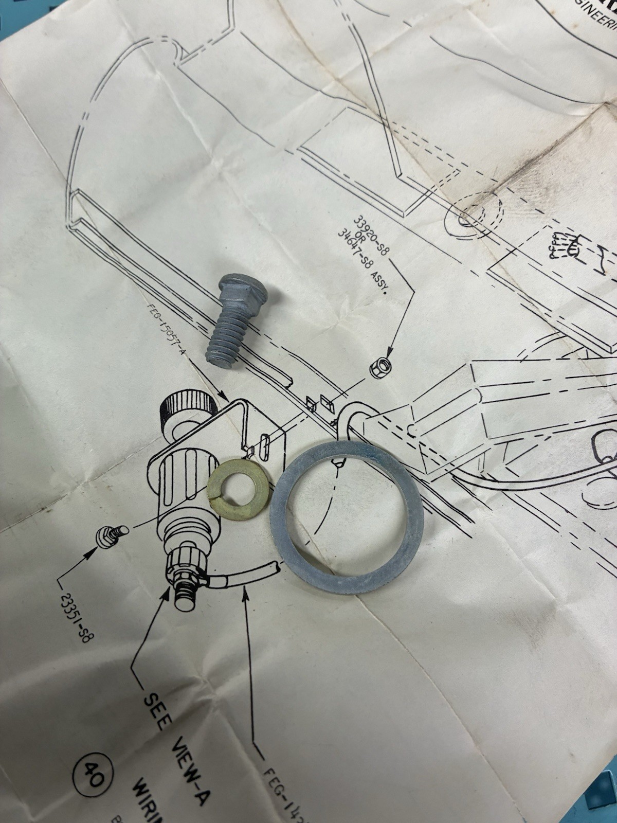 1957-58 FORD UNDER DASH CIGAR LIGHTER BRACKET NOS FORD