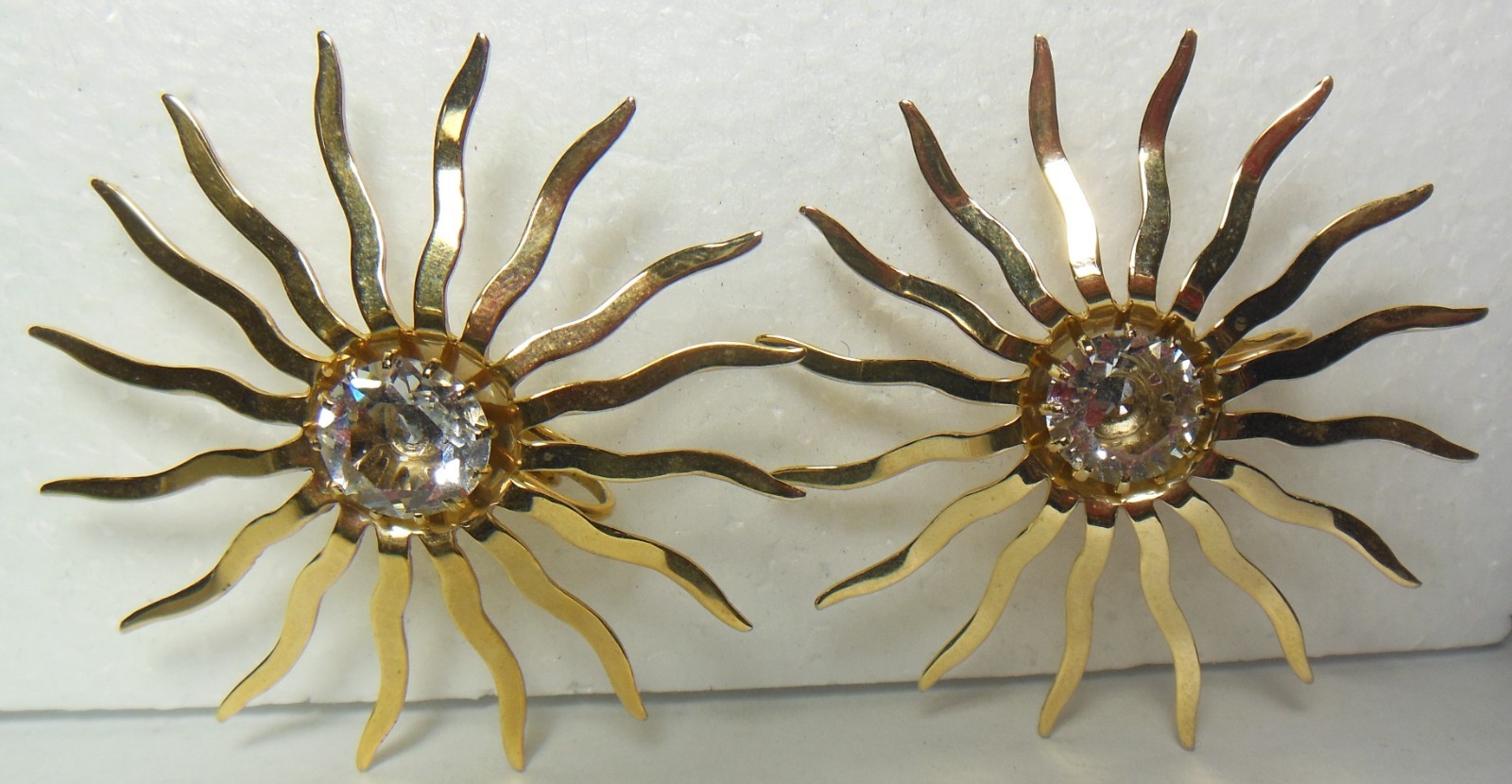 Vintage fascination sunburst rhinestone clip on earrings Signed Sarah Coventry
