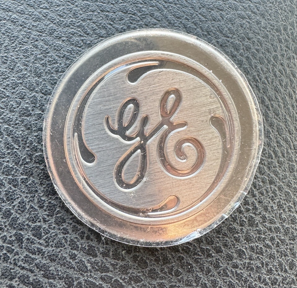 OEM GE Logo /Badge  WRO4X10222 Removed From Refrigerator Model # GTS18HGNFRWW