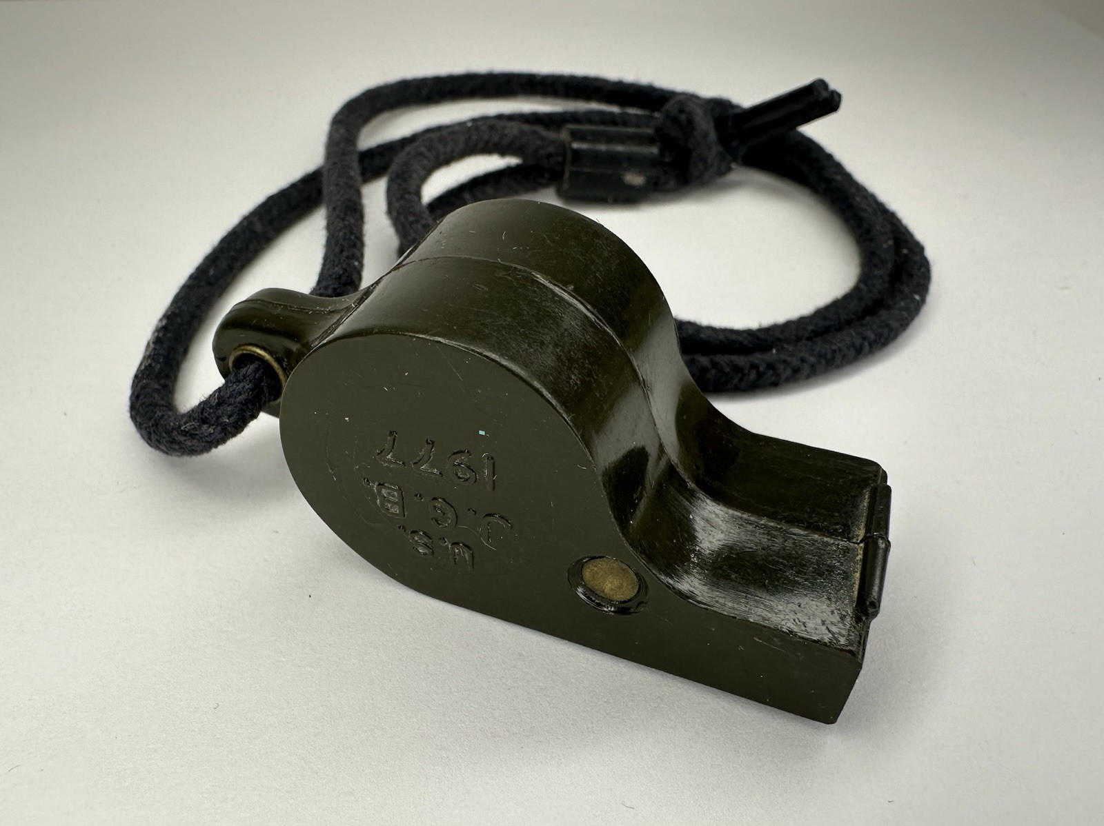 Military Hard Plastic Whistle Cork Ball U.S. J.G.B. 1977 Dark Green / Vintage