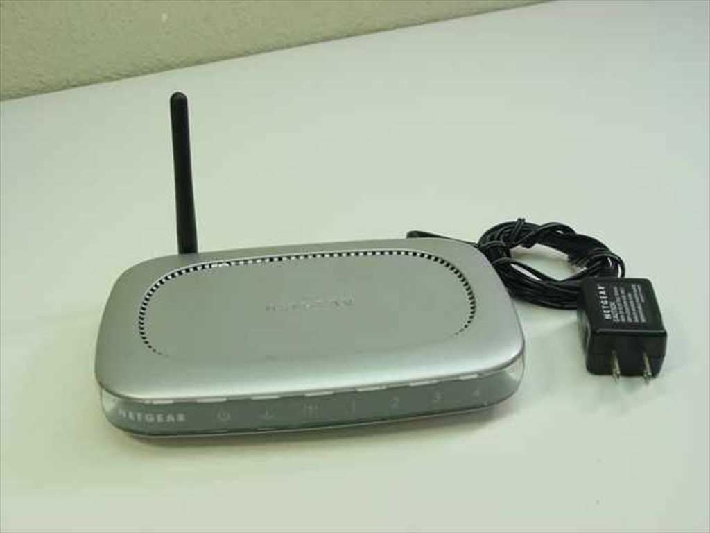 Netgear WGT624 108 Mbps 4-Port Wireless Firewall Router w/AC Adapter Bundle