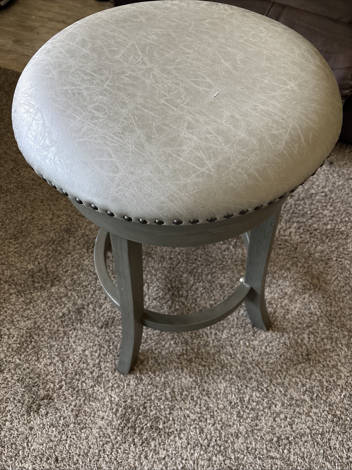 Modern Round Upholstered Accent Stool – Gray Faux Leather with Nailhead Trim
