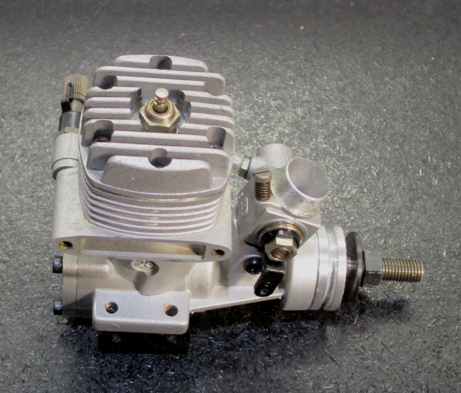 O.S. MAX-25FX 4.07cc 2-Stroke Glow Engine Includes muffler; used for RC airplane