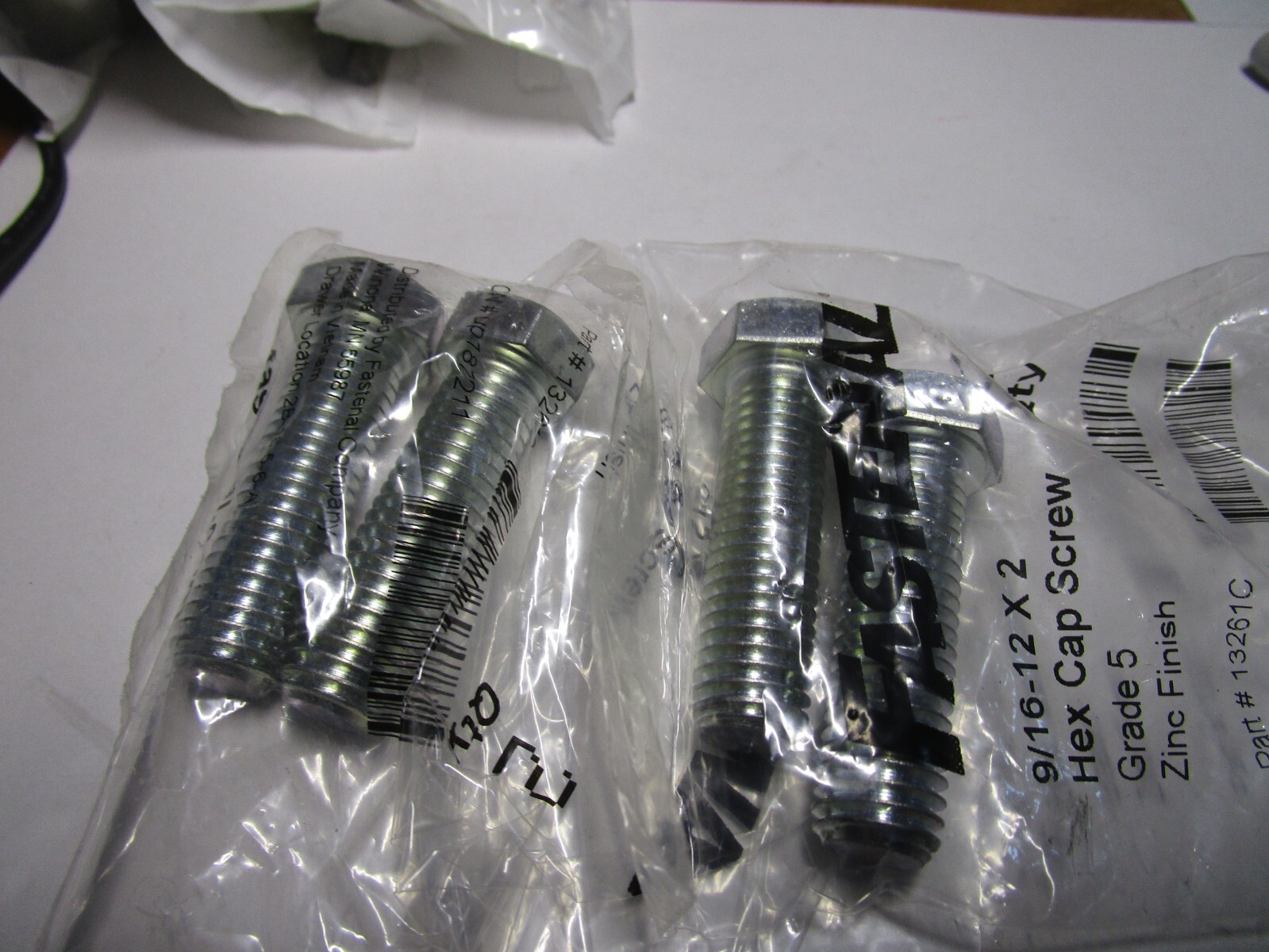 9/16"-12 x 2" Grade 5 Zinc Finish Hex Cap Screw QTY 4