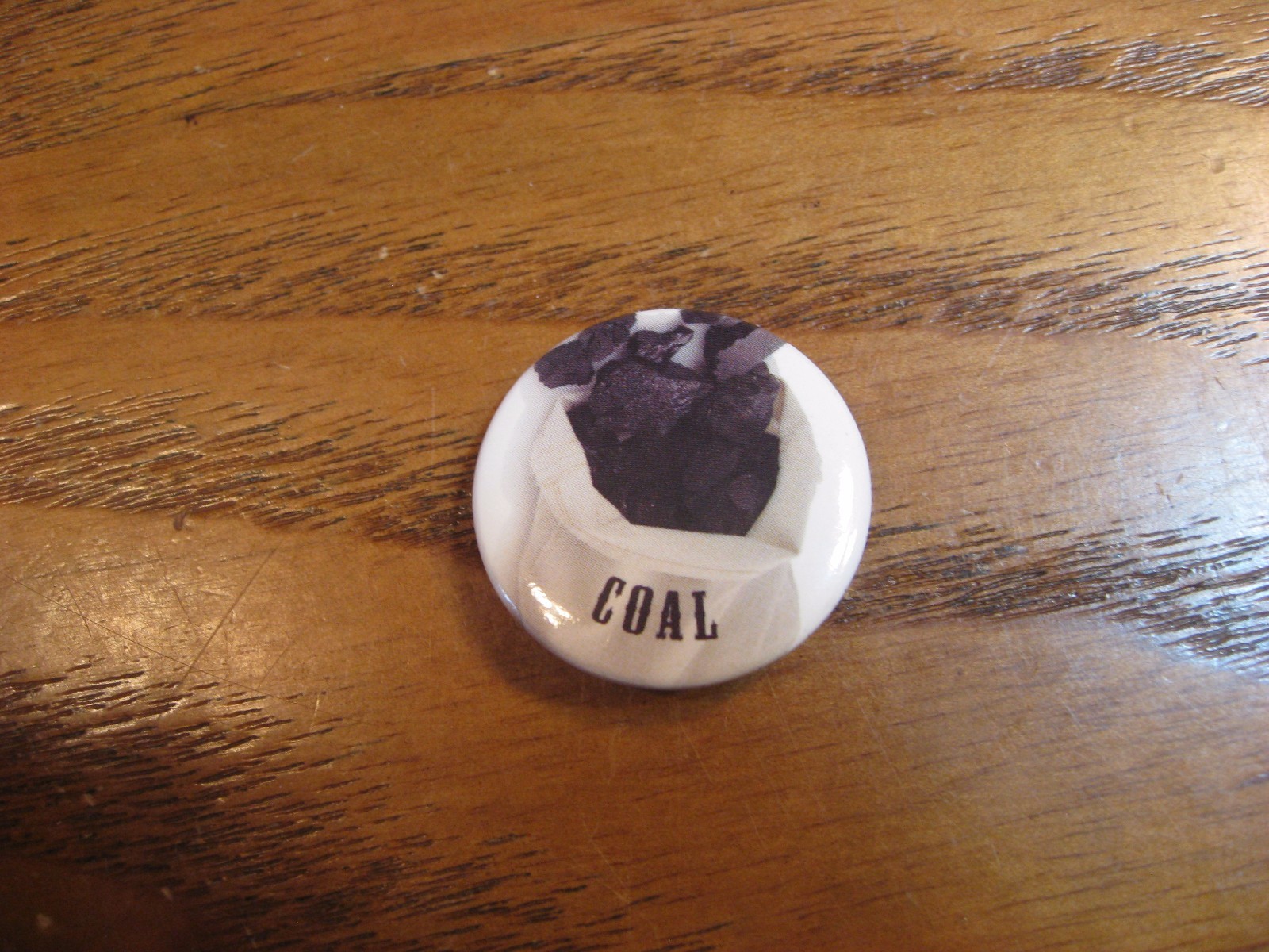 JC Penneys Lump of Coal Collectible Button/ Pin - 2012