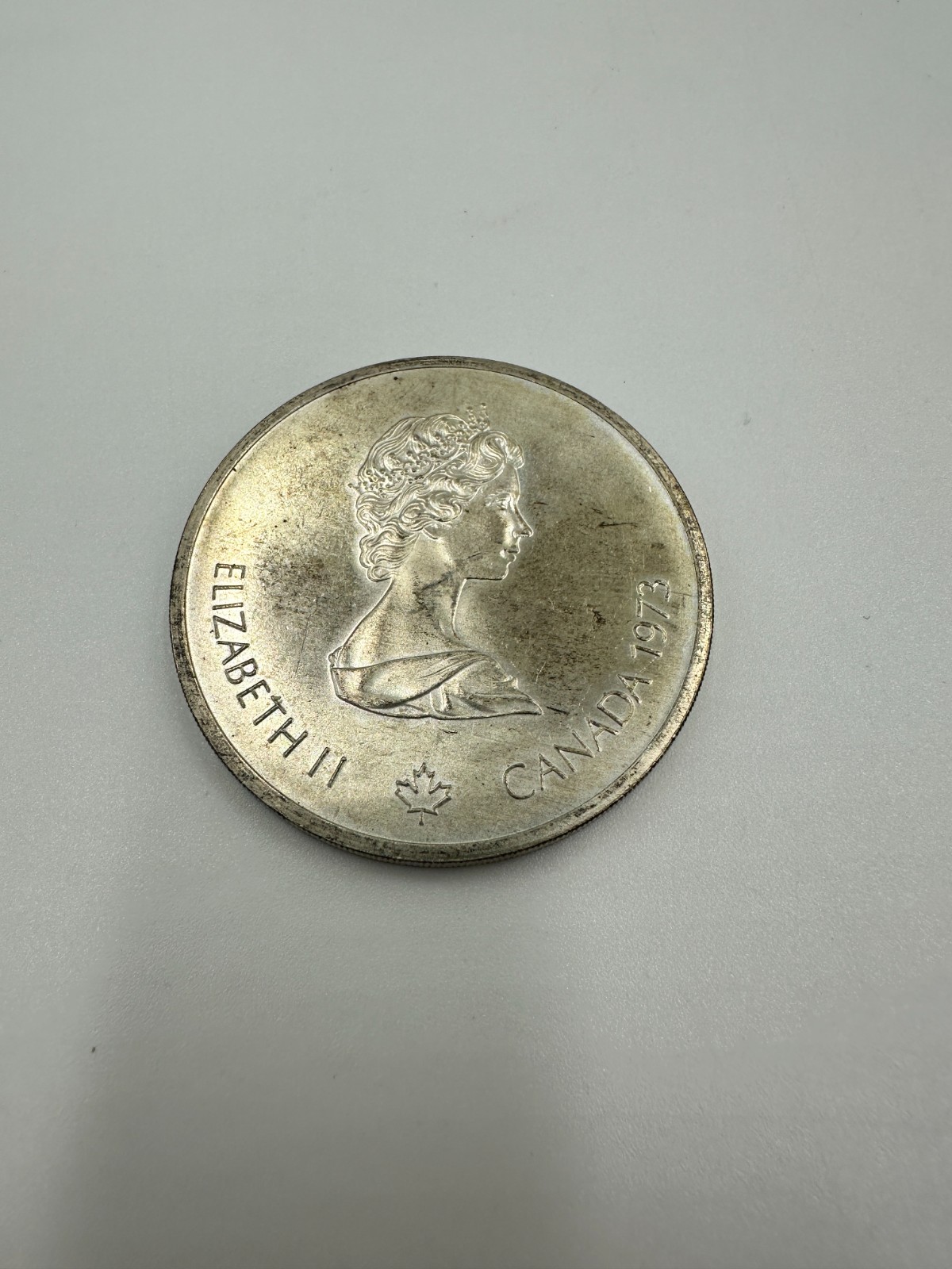 1973 Canada Elizabeth II Olympics 1976 Montreal World Map Silver $10 Coin