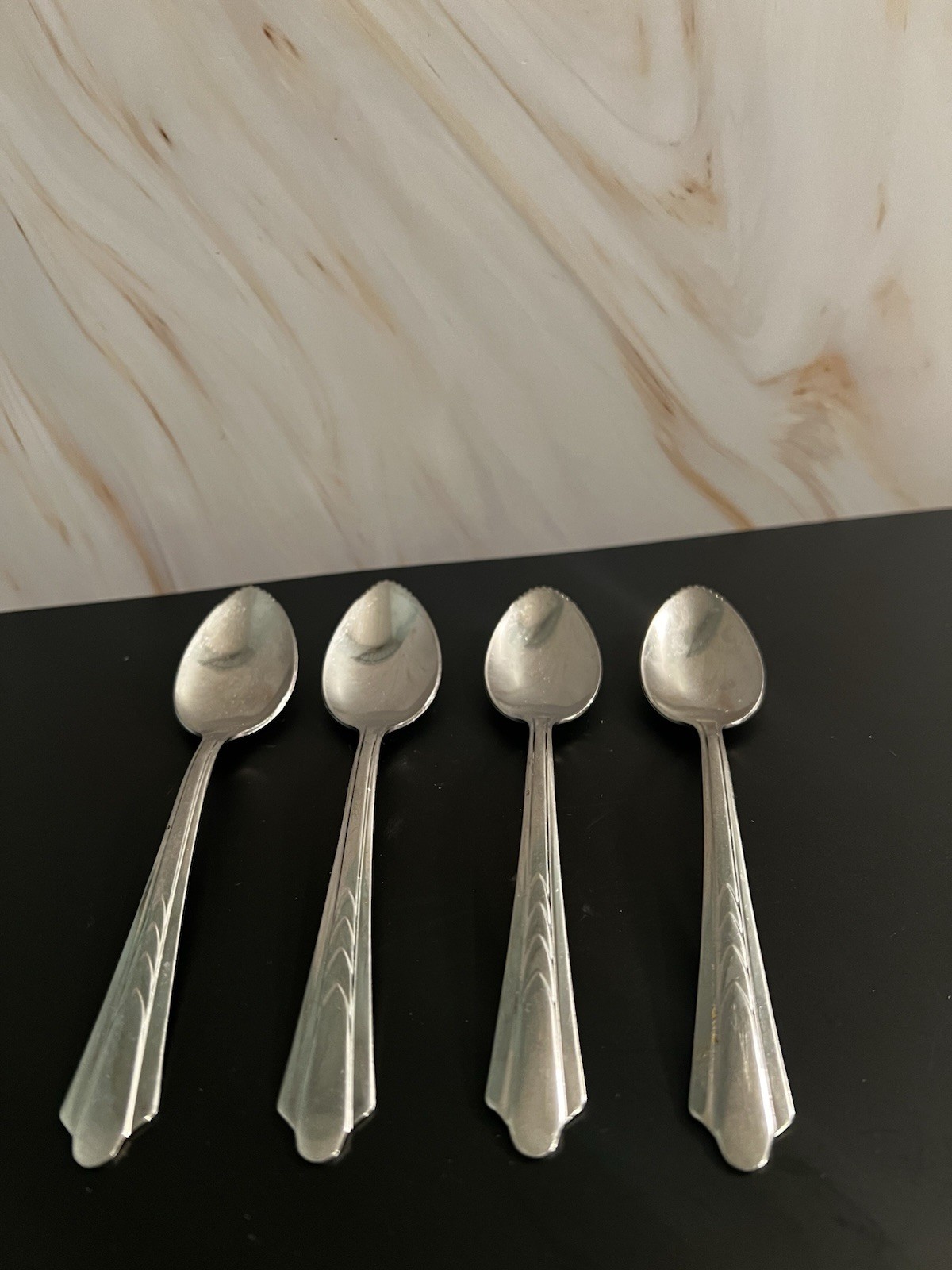 Set of 4 Silver Metal Flatware Spoons with Decorative Silver Tone Metal Handles