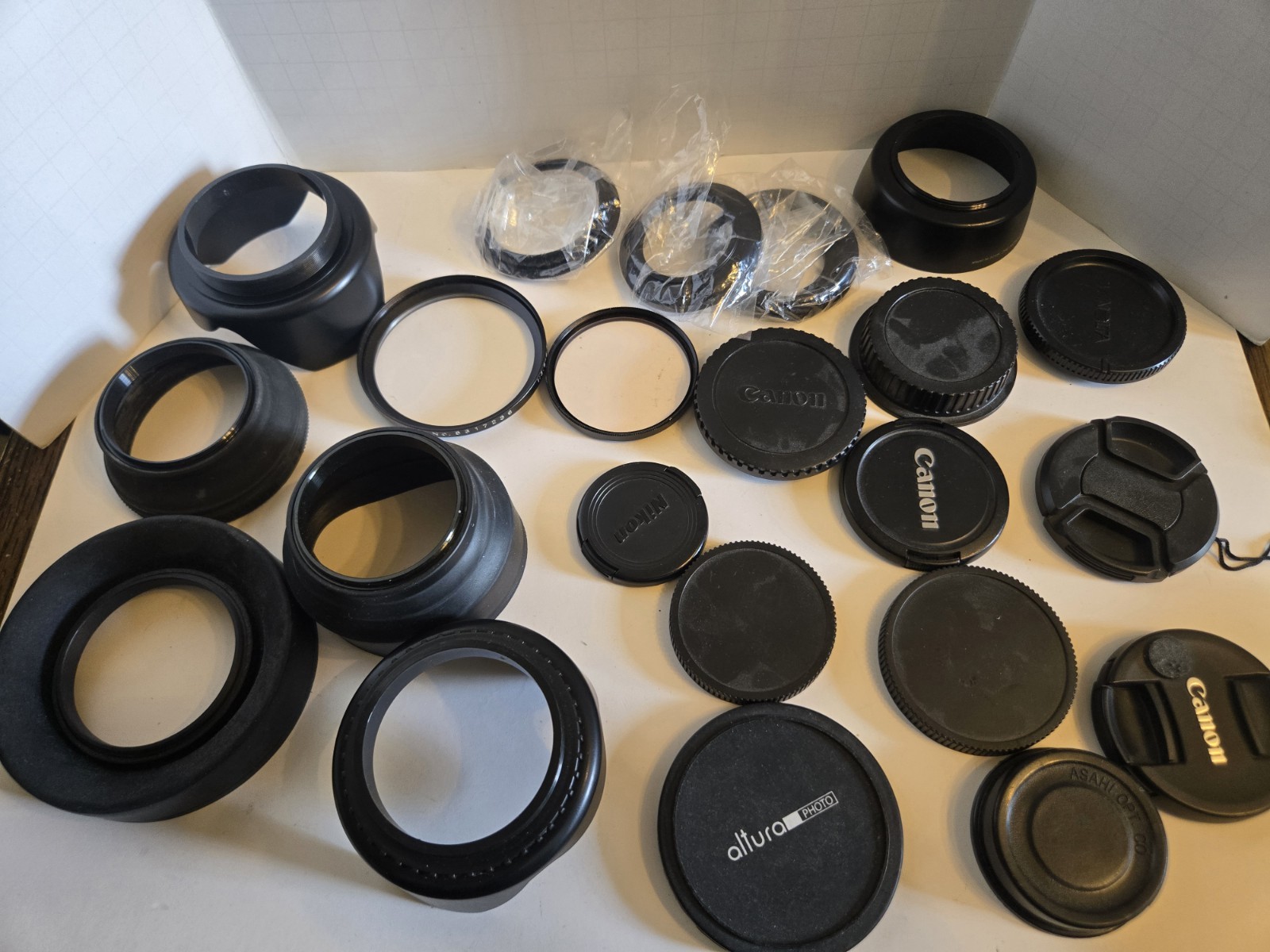 Various Camera Lens Covers And Hoods. Canon Nikon Altura. Entire Lot Pictured