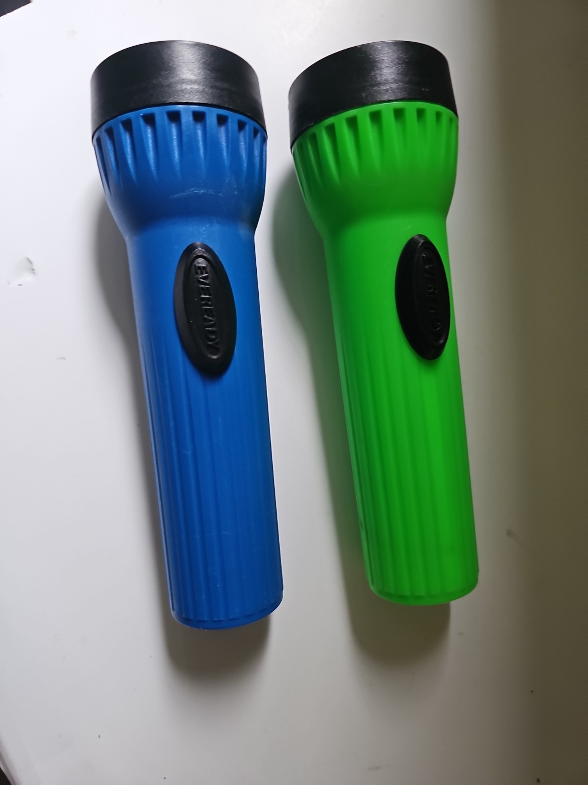 Eveready Plastic Flashlight Regular Light Uses 2D Battery 2 Count Green Blue