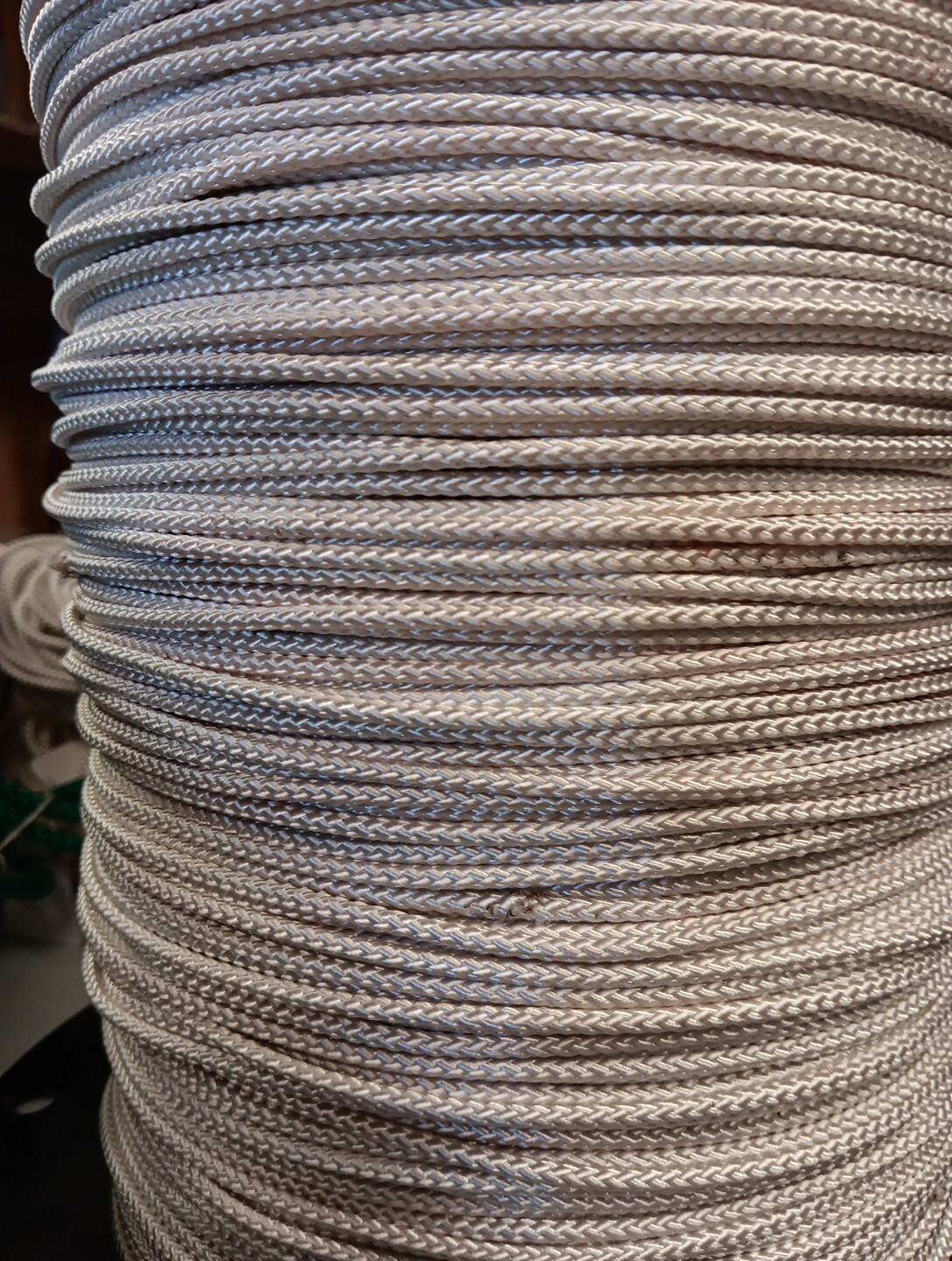1/8" x 4000 ft. Diamond Braid Old Stock Polyester rope spool. 2 Lengths. White