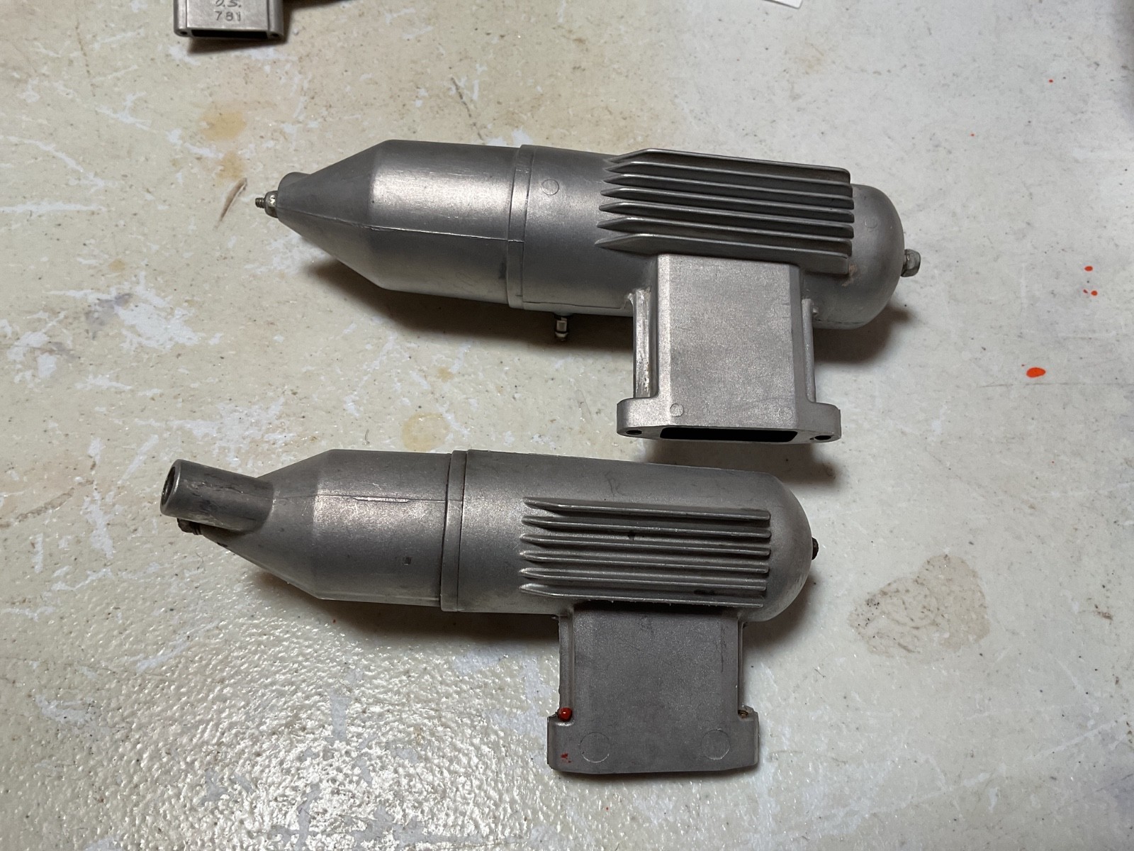 OS E-4010 and OS 873 Mufflers