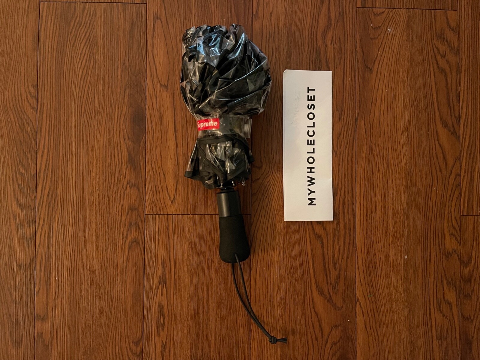 SUPREME NEW YORK SS20 SHEDRAIN TRANSPARENT CHECKERBOARD UMBRELLA