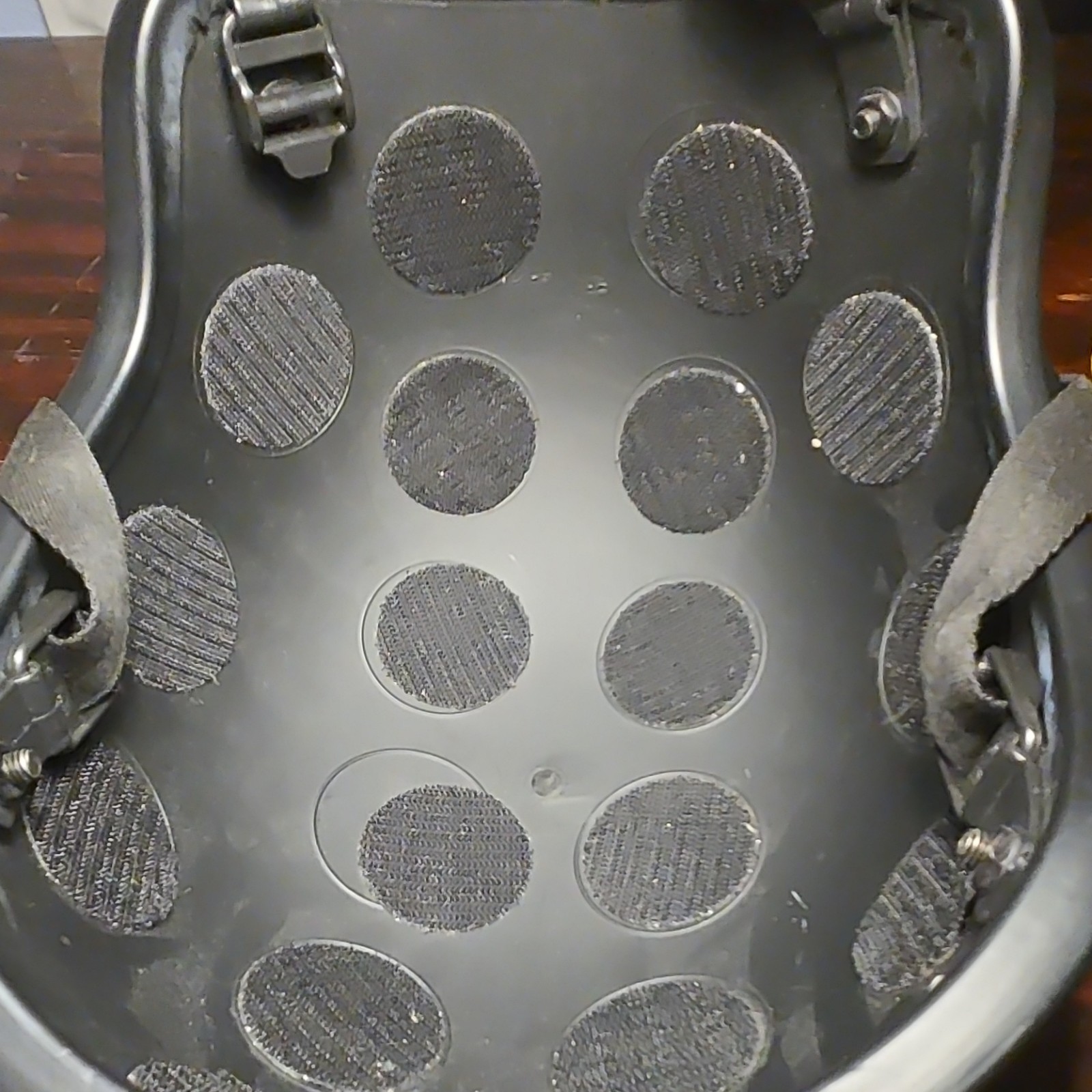 Black AIRSOFT helmet with rails for attaching headphones or flashlights.